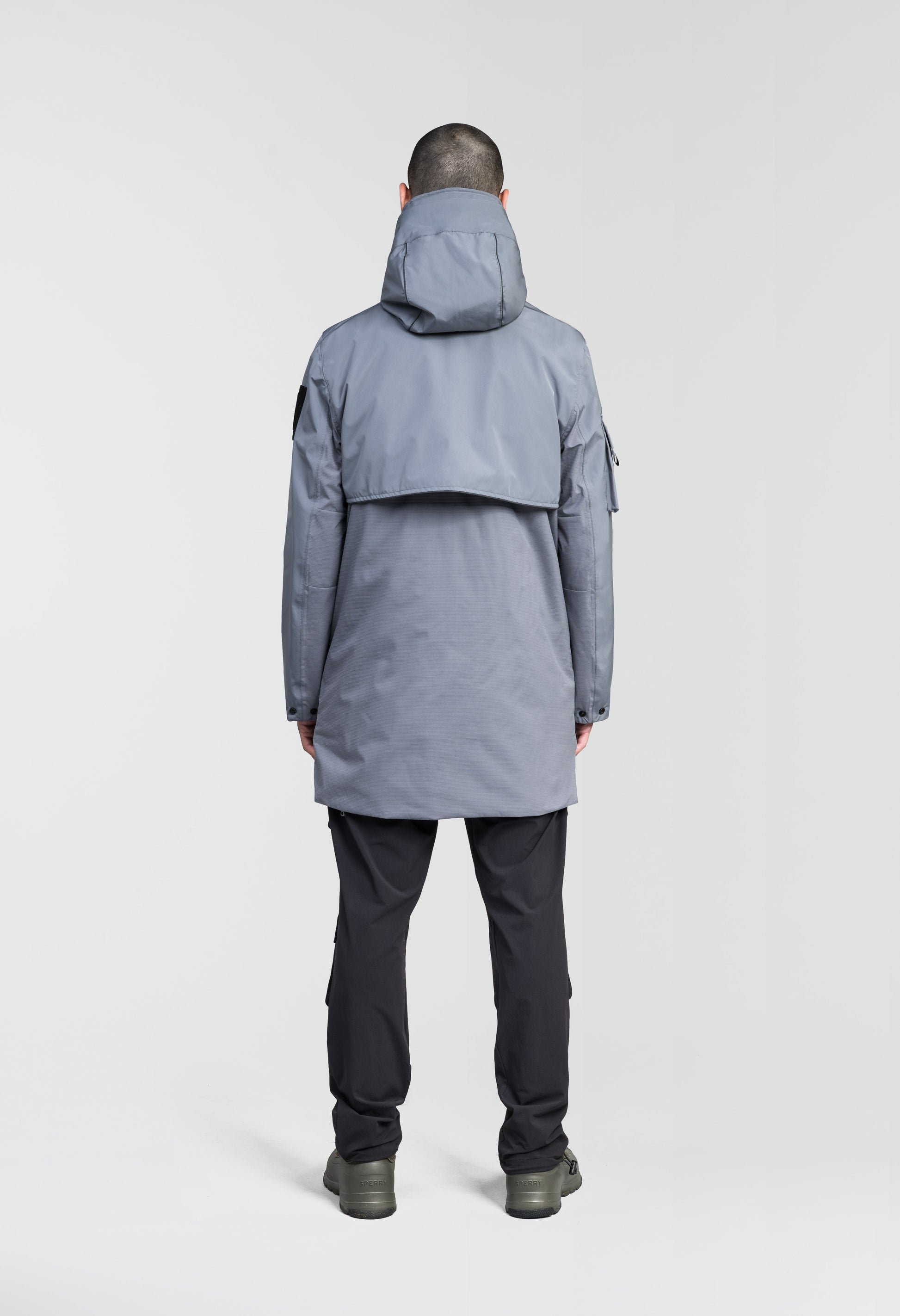 Alta Men's Performance Shell Jacket in hip length, Primaloft Gold Insulation Active+, chest and waist pockets, ventilation under arms, reflective detailing on hood and back, two-way front zipper, and non-removable hood with adjustable drawstrings, in Concrete