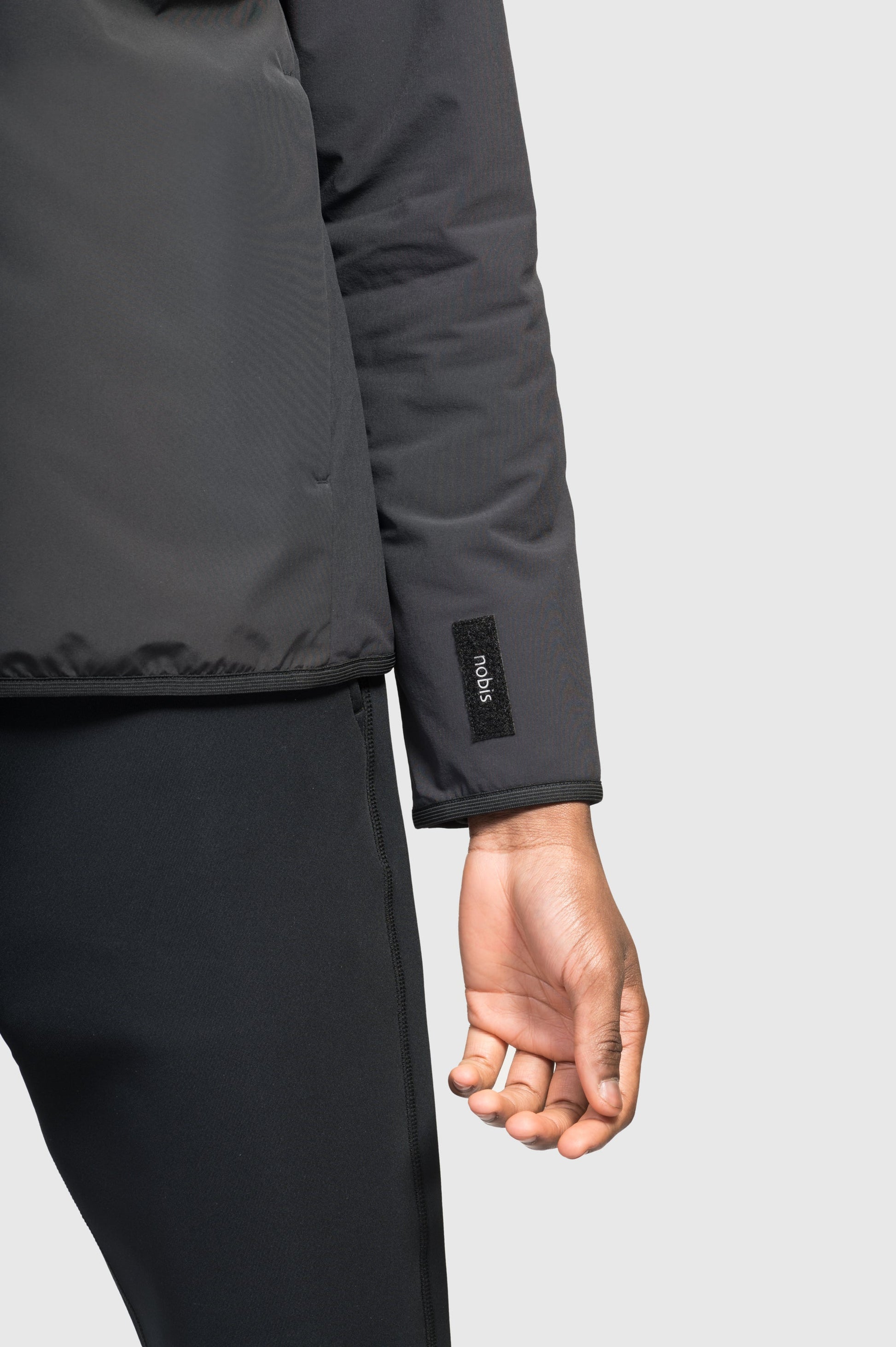 Men's hip length mid layer jacket with non-removable hood and two-way zipper in Black