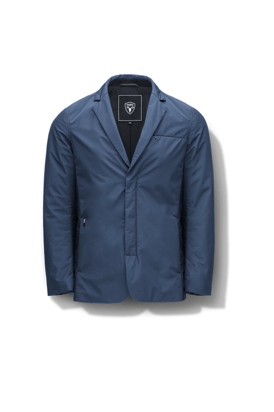 Cody Men's Tailored Travel Blazer in 3-ply micro denier and stretch nylon fabrication with DWR coating, Primaloft Gold Insulation Active+, hidden two-way zipper at centre front with snap closure placket, three invisible exterior zipper pockets, double back pleats, and hidden snap placket at cuffs, in Marine + Marine