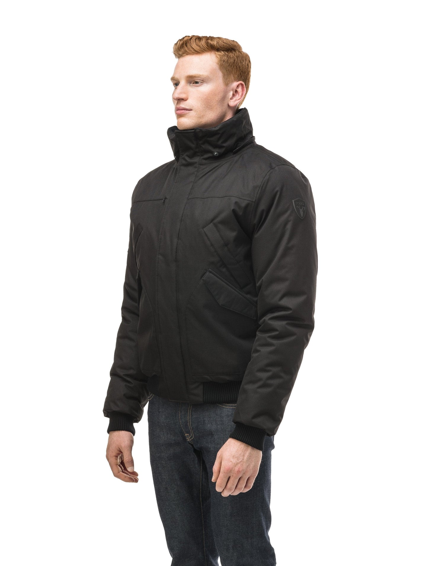 Men's classic down filled bomber jacket with a down filled hood that features a removable coyote fur trim and concealed moldable framing wire in Black