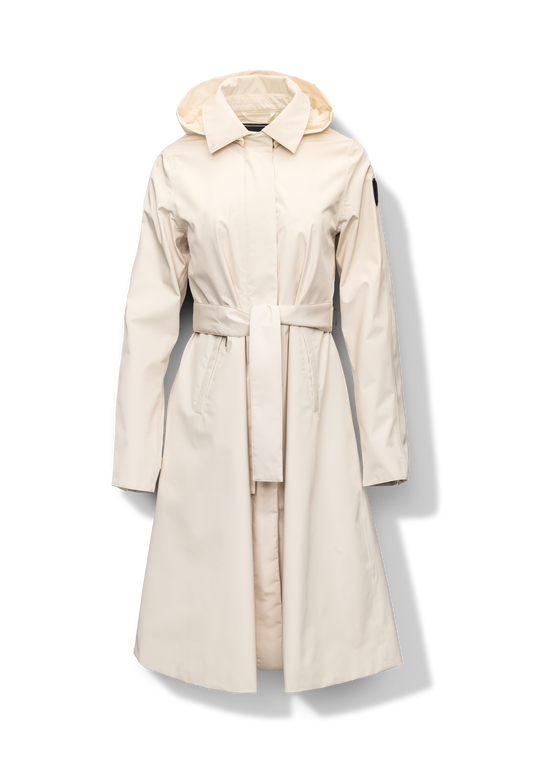 Ivy Ladies Tailored Trench Coat in knee length, 3-Ply Micro Denier fabrication, retractable non-removable hood, front wind flap with snap button closure, removable belt, and adjustable snap cuffs, in Wheat + Wheat