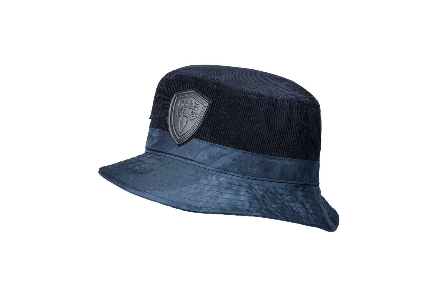 Kaia Unisex Tailored Bucket Hat in a 100% cotton corduroy and 3-ply micro denier fabrication, unstructured crown, black leather Nobis shield logo on crown front, and small flap pocket on the right side crown, in Navy