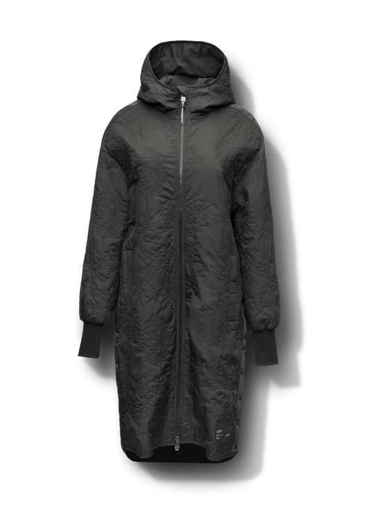 Surrey Women's Performance Quilted Long Mid Layer Jacket in knee length, Primaloft Gold Insulation Active+, non-removable hood, single welt magnetic closure pockets, ribbed cuffs, two-way centre front zipper, grosgrain ribbon detail and shoulders and side seam, and snap closure side seam vents, in Black + Black