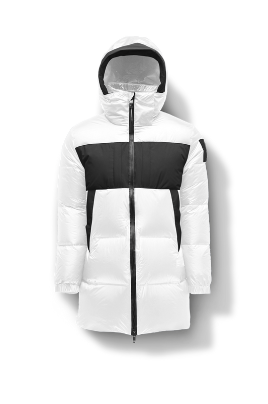 Neelix Men's Long Puffer Jacket in thigh length, premium cire technical nylon taffeta and stretch ripstop fabrication, Premium Canadian origin White Duck Down insulation, non-removable down-filled hood, two-way centre-front zipper, pit zipper vents, hidden chest zipper pockets, fleece-lined magnetic closure waist pockets, in Chalk + Chalk