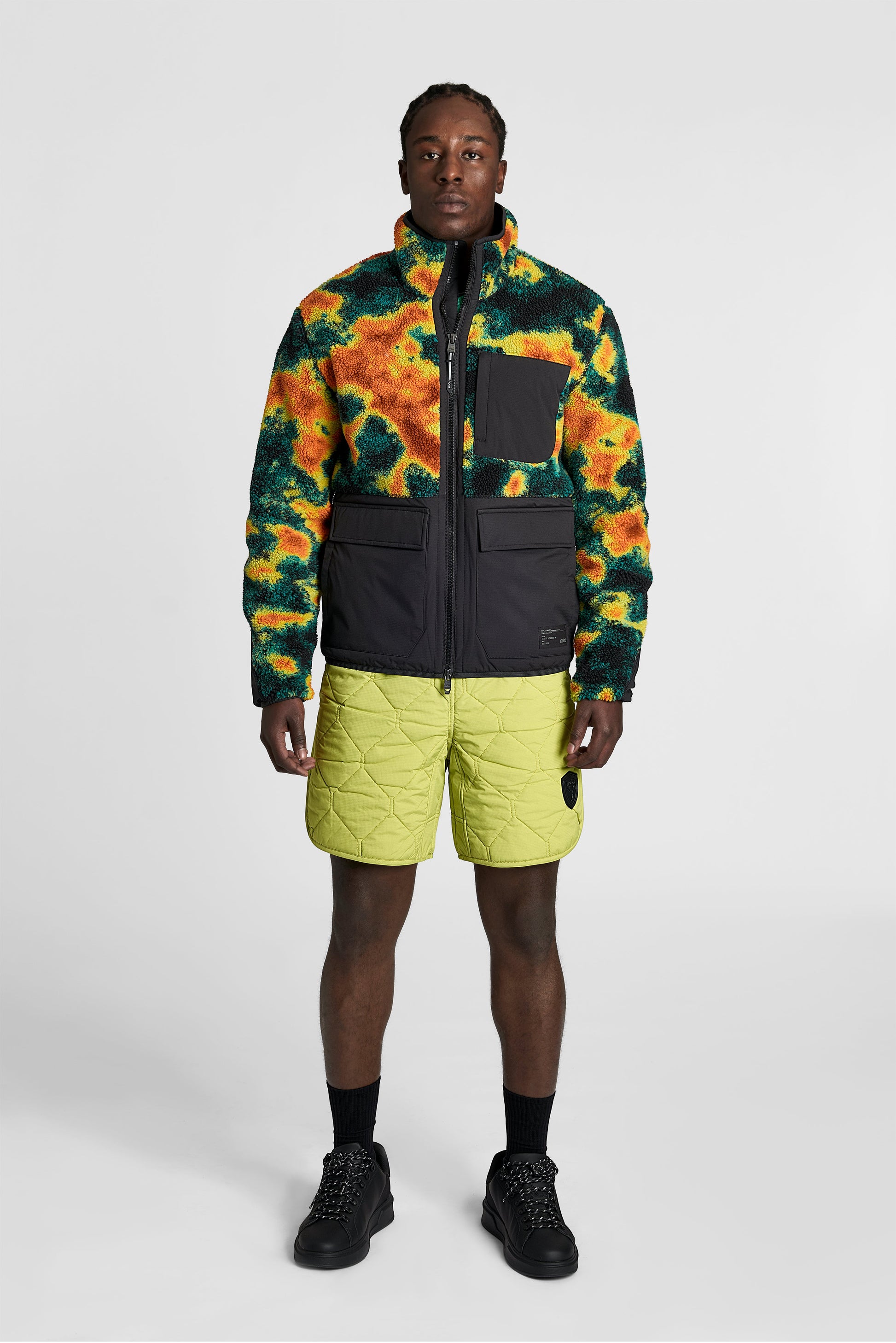 Kepler Men's Berber Zip Front Sweater in hip length, premium berber and stretch ripstop fabrication, Primaloft Gold Insulation Active+, two-way centre-front zipper, zipper pocket at left chest, magnetic closure flap pockets at waist with additional side-entry pockets, in Heat Map