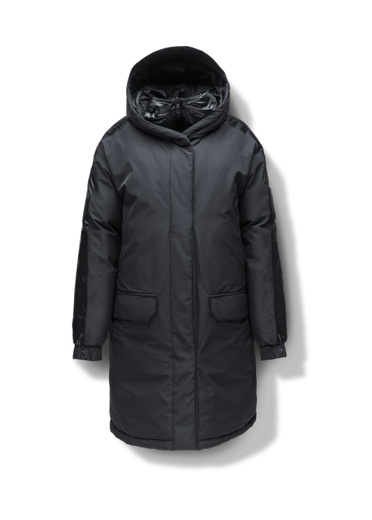 Slyn Women's Performance Parka in thigh length, premium 3-ply micro denier and cire technical nylon taffeta fabrication, Premium Canadian origin White Duck Down insulation, non-removable down-filled hood, inner hooded gilet, two-way centre-front zipper with magnetic closure wind flap, fleece-lined pockets at chest and waist, pit zipper vents, in Black + Black