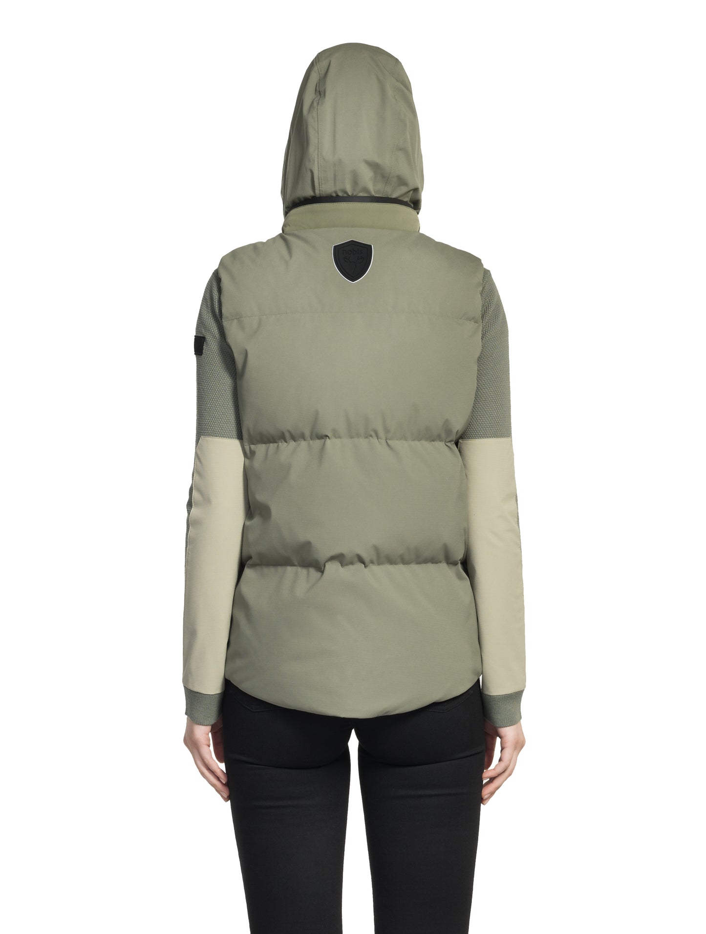 Oren Ladies Performance Vest in hip length, Durable Stretch Ripstop and 3-Ply Micro Denier fabrication, Premium Canadian White Duck Down insulation, tuck-away waterproof hood, and two-way centre front zipper, in Clover