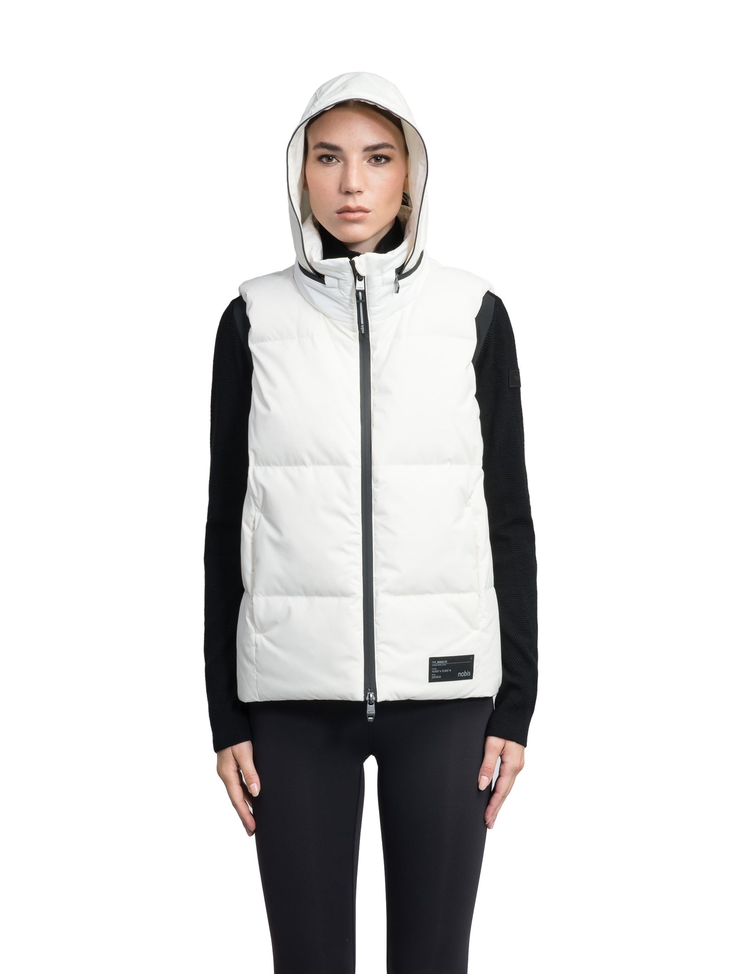 Oren Ladies Performance Vest in hip length, Durable Stretch Ripstop and 3-Ply Micro Denier fabrication, Premium Canadian White Duck Down insulation, tuck-away waterproof hood, and two-way centre front zipper, in Chalk