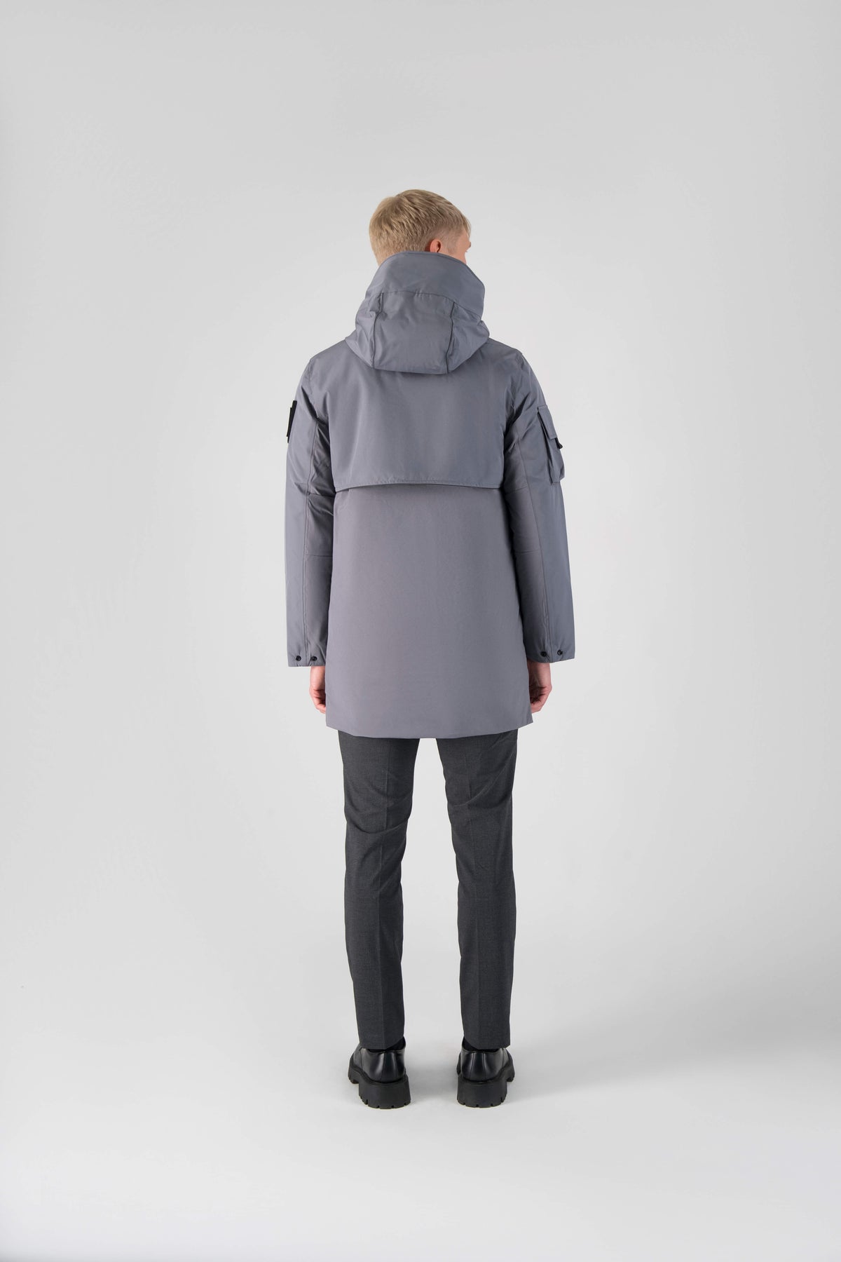 Alta Men's Performance Shell Jacket in hip length, Primaloft Gold Insulation Active+, chest and waist pockets, ventilation under arms, reflective detailing on hood and back, two-way front zipper, and non-removable hood with adjustable drawstrings, in Concrete
