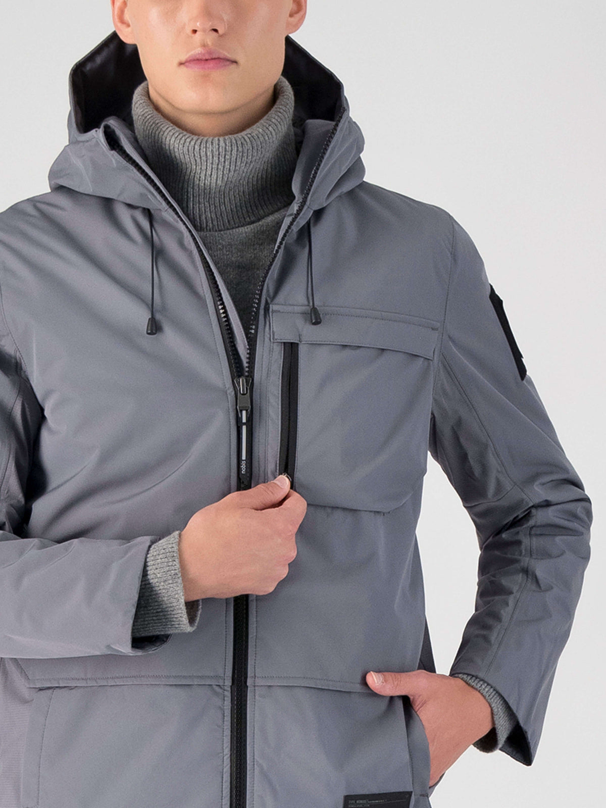 Alta Men's Performance Shell Jacket in hip length, Primaloft Gold Insulation Active+, chest and waist pockets, ventilation under arms, reflective detailing on hood and back, two-way front zipper, and non-removable hood with adjustable drawstrings, in Concrete