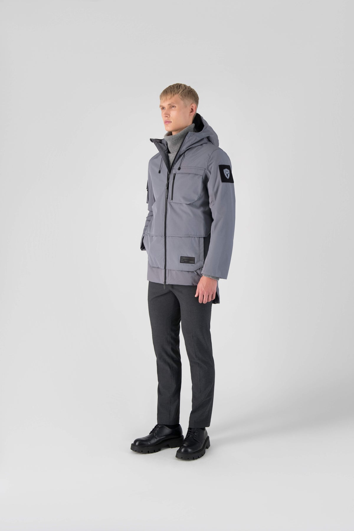 Alta Men's Performance Shell Jacket in hip length, Primaloft Gold Insulation Active+, chest and waist pockets, ventilation under arms, reflective detailing on hood and back, two-way front zipper, and non-removable hood with adjustable drawstrings, in Concrete