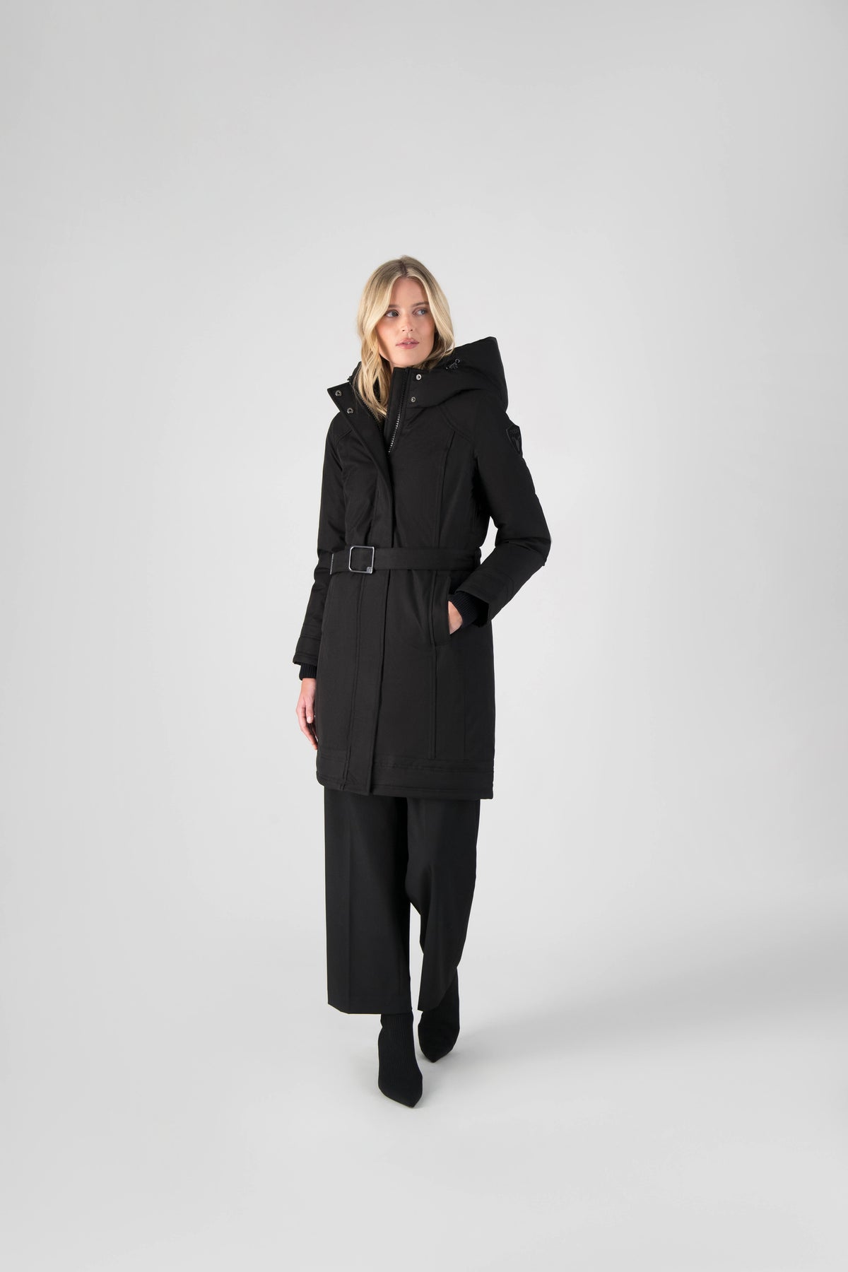 Women's Thigh length own parka with a furless oversized hood in Black