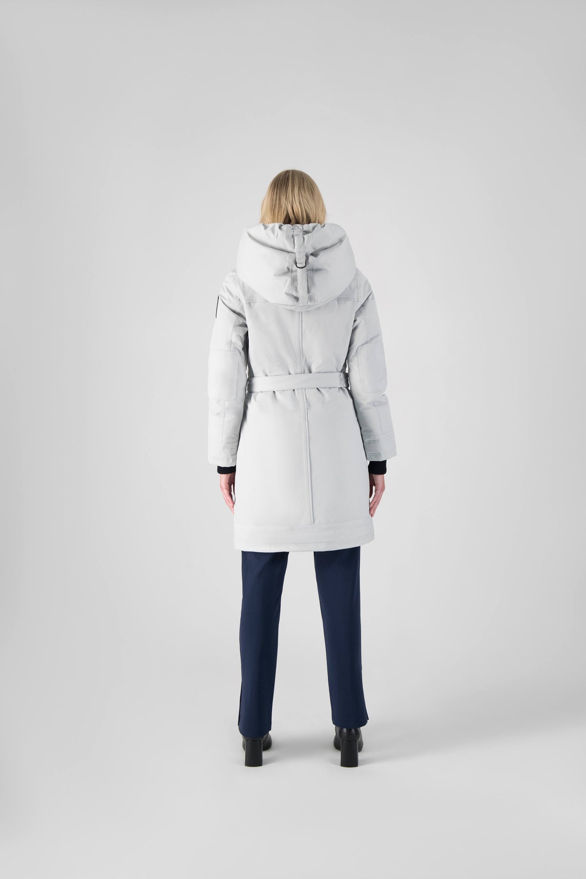Women's Thigh length own parka with a furless oversized hood in Light Grey