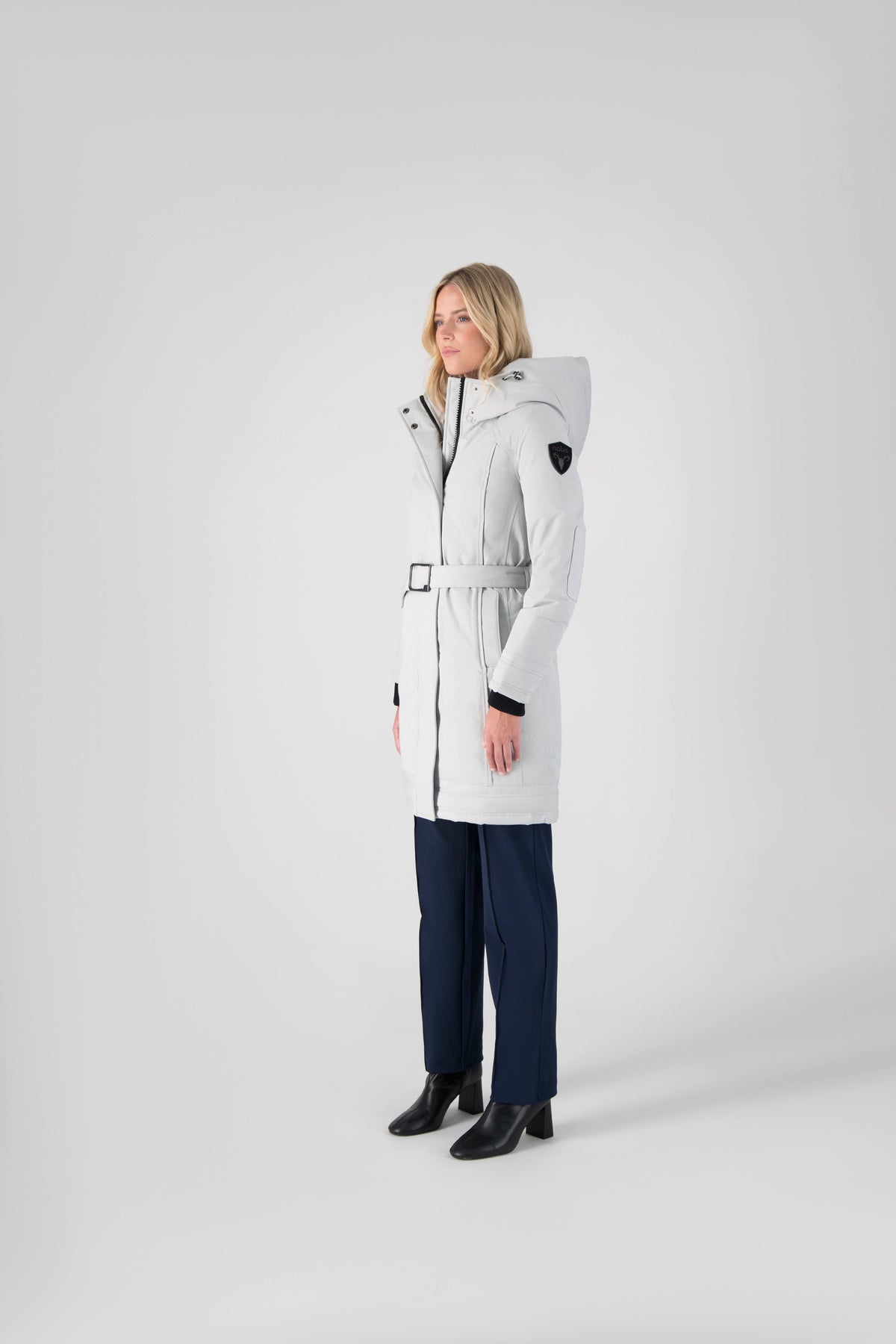 Women's Thigh length own parka with a furless oversized hood in Light Grey
