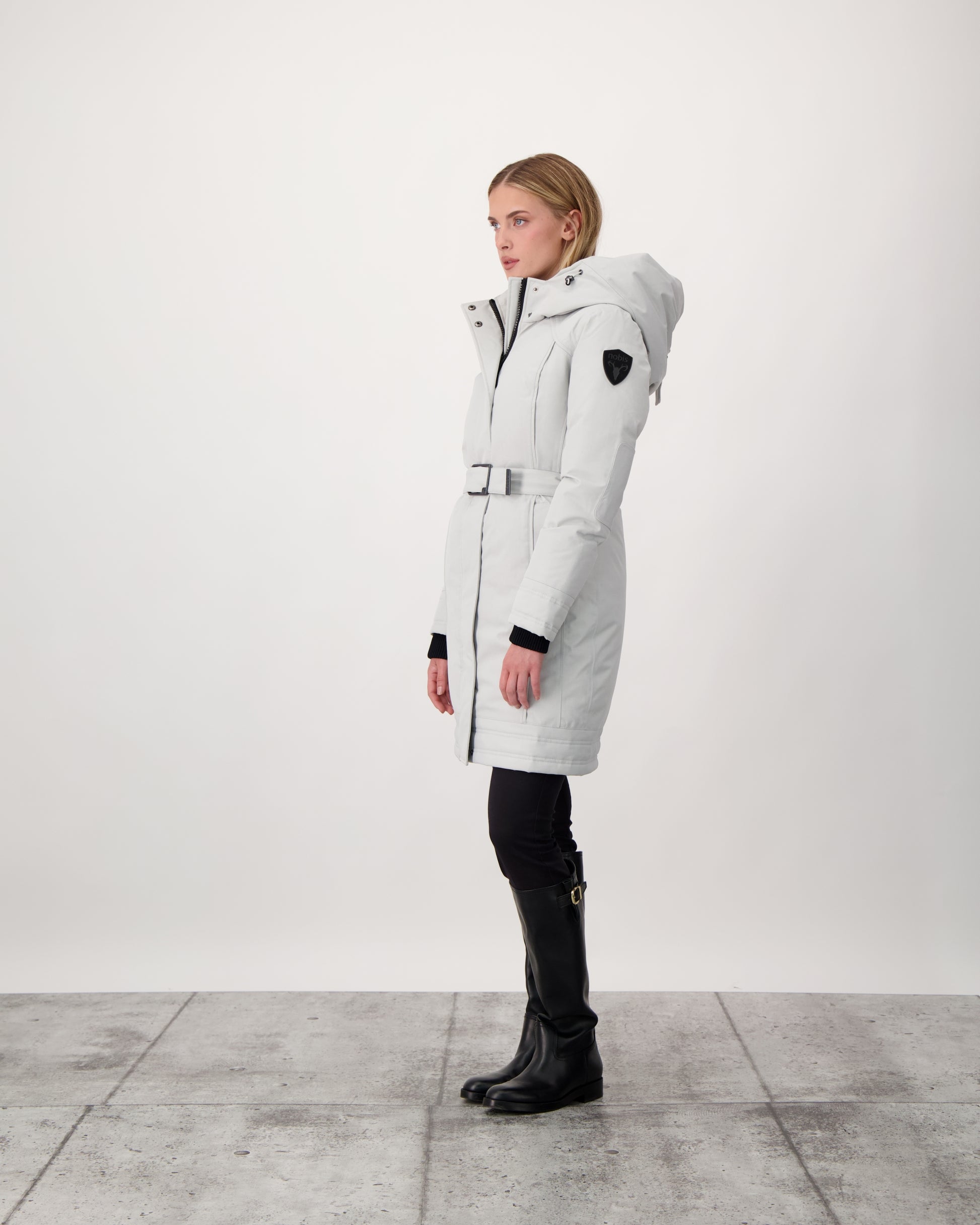 Women's Thigh length own parka with a furless oversized hood in CH Light Grey