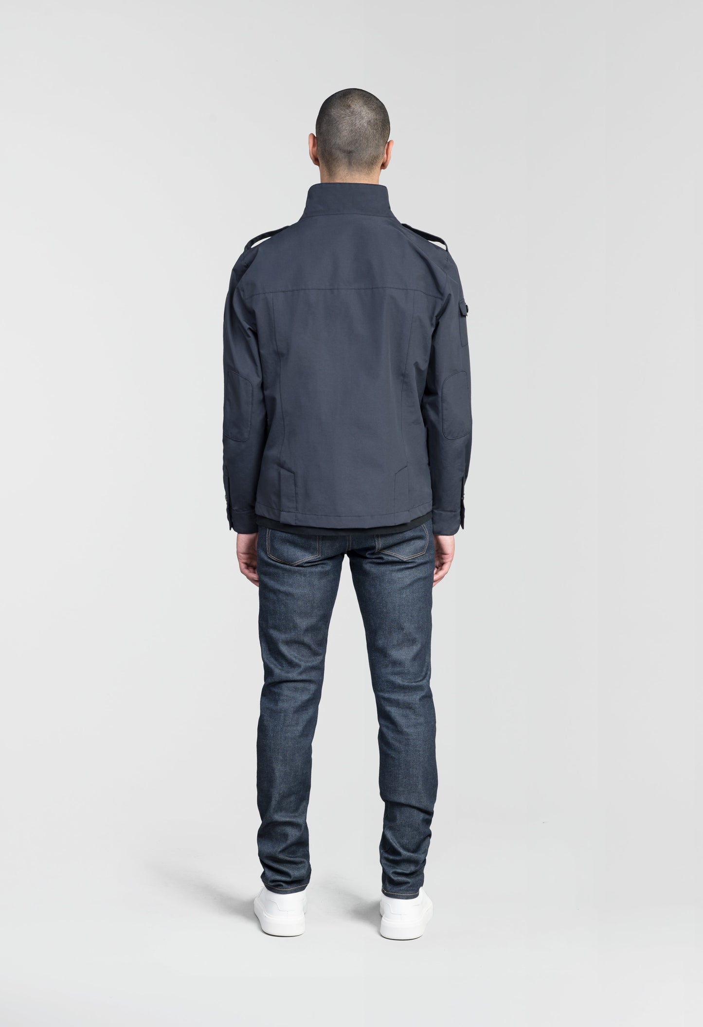 Men's waist length military style jacket in Navy