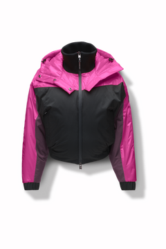 Aspen Women's Batwing Jacket in hip length, premium stretch ripstop and cire technical nylon taffeta fabrication, Premium Canadian White Duck Down insulation, non-removable down-filled hood, centre front two-way zipper, winged arm detailing, in Festival Fushia/Potent Purple