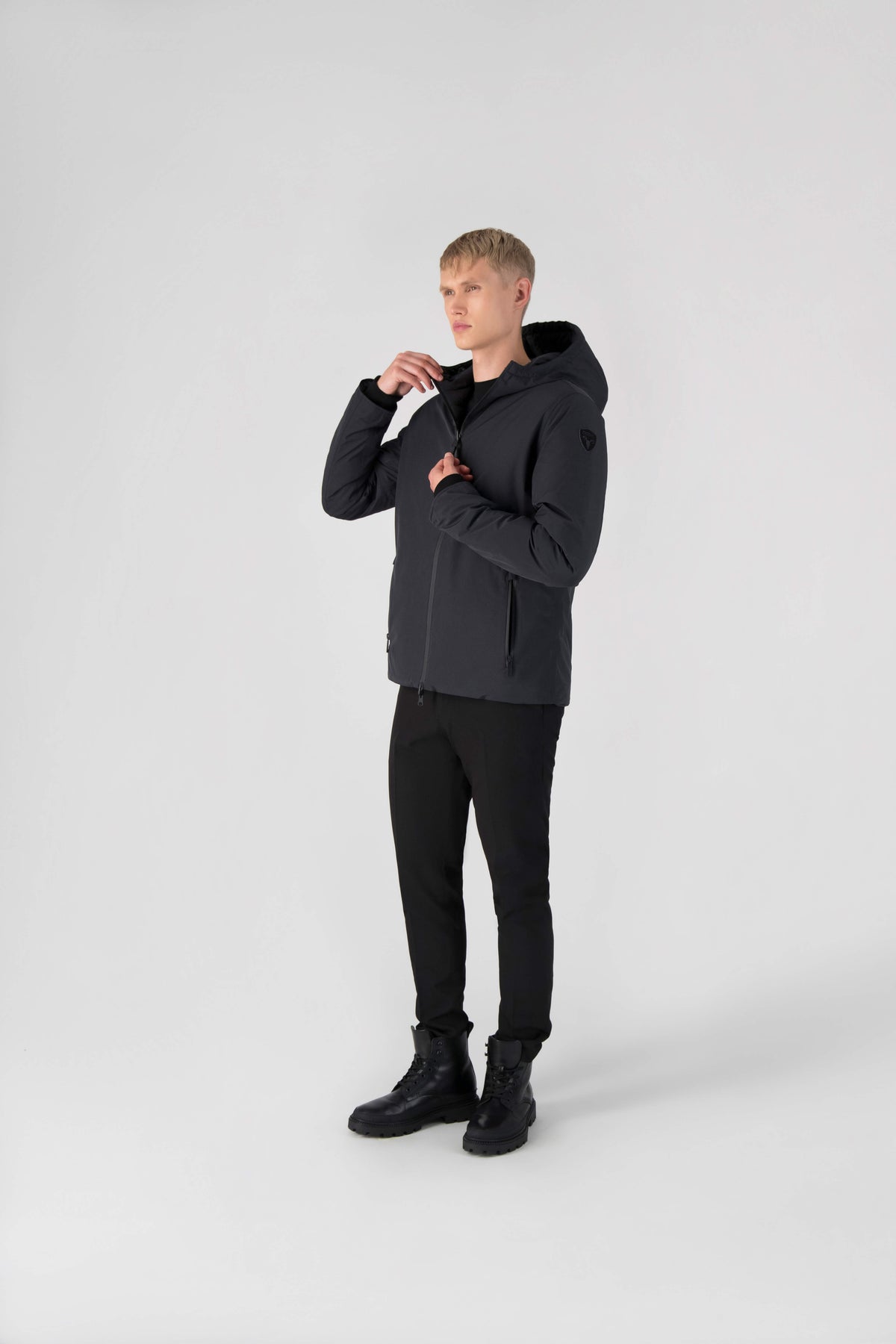 Chris Men's Mid Weight Reversible Puffer Jacket in hip length, Canadian duck down insulation, non-removable adjustable hood, ribbed cuffs, and quilted body on reversible side, in Black