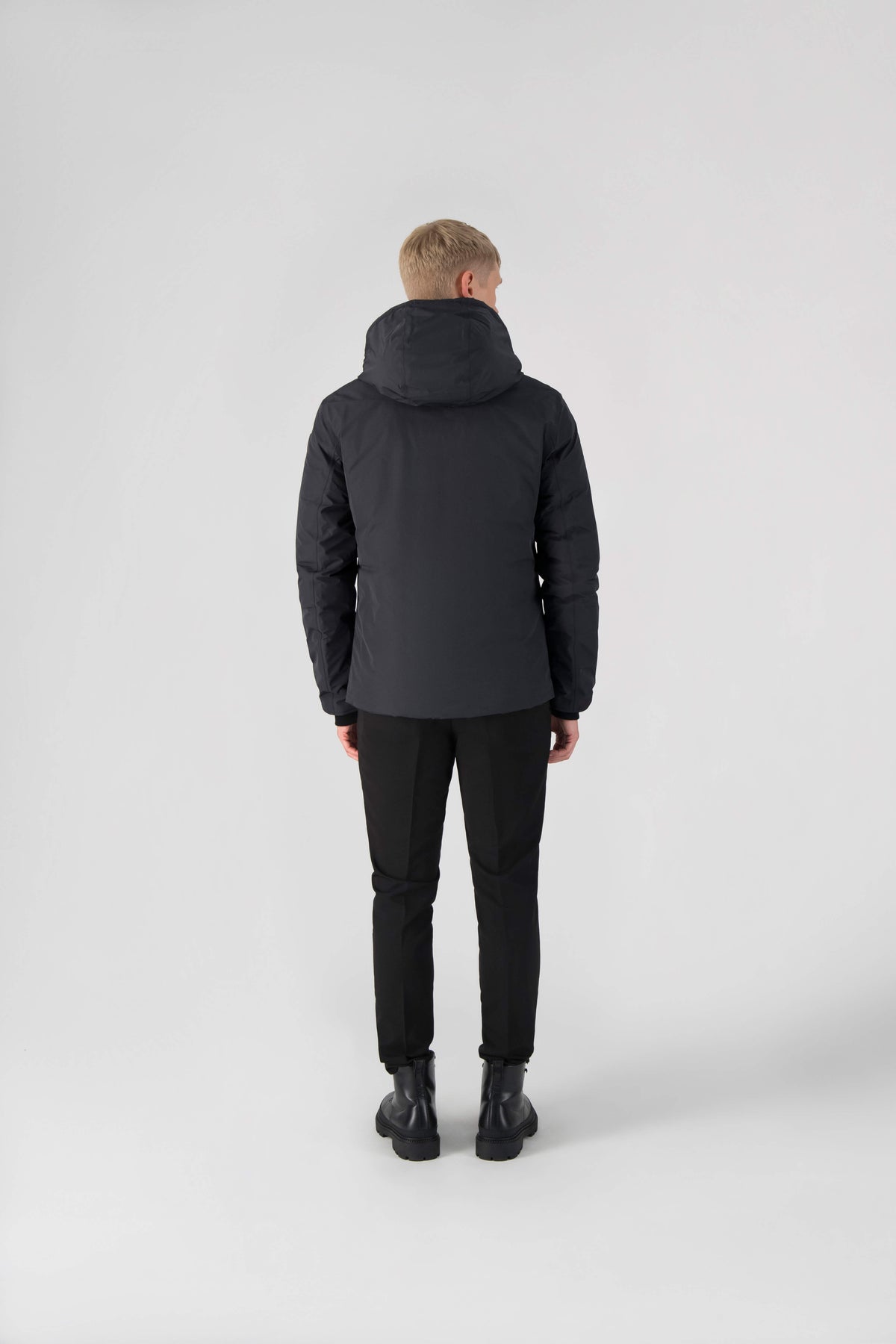 Chris Men's Mid Weight Reversible Puffer Jacket in hip length, Canadian duck down insulation, non-removable adjustable hood, ribbed cuffs, and quilted body on reversible side, in Black