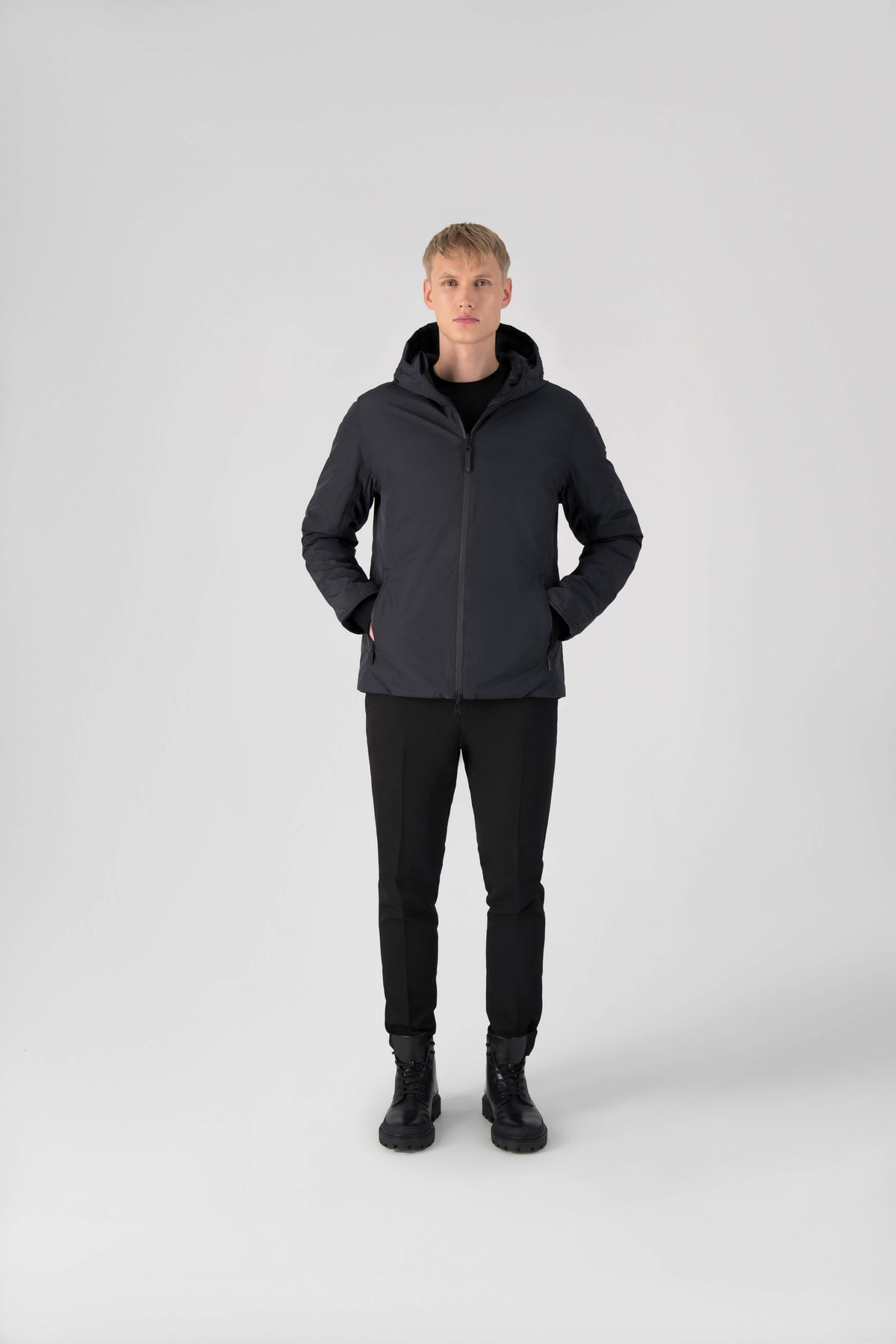 Chris Men's Mid Weight Reversible Puffer Jacket in hip length, Canadian duck down insulation, non-removable adjustable hood, ribbed cuffs, and quilted body on reversible side, in Black
