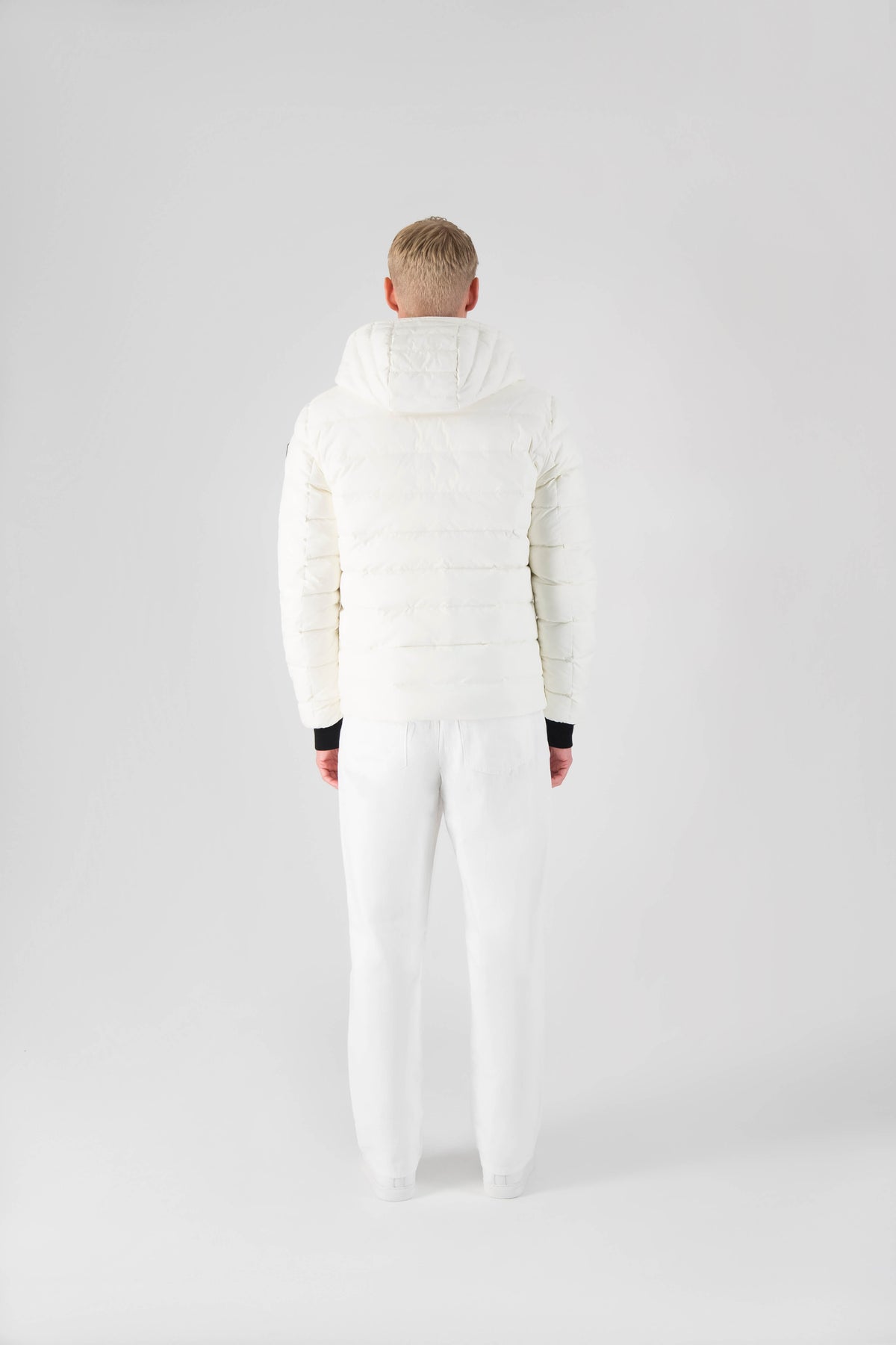 Chris Men's Mid Weight Reversible Puffer Jacket in hip length, Canadian duck down insulation, non-removable adjustable hood, ribbed cuffs, and quilted body on reversible side, in Chalk