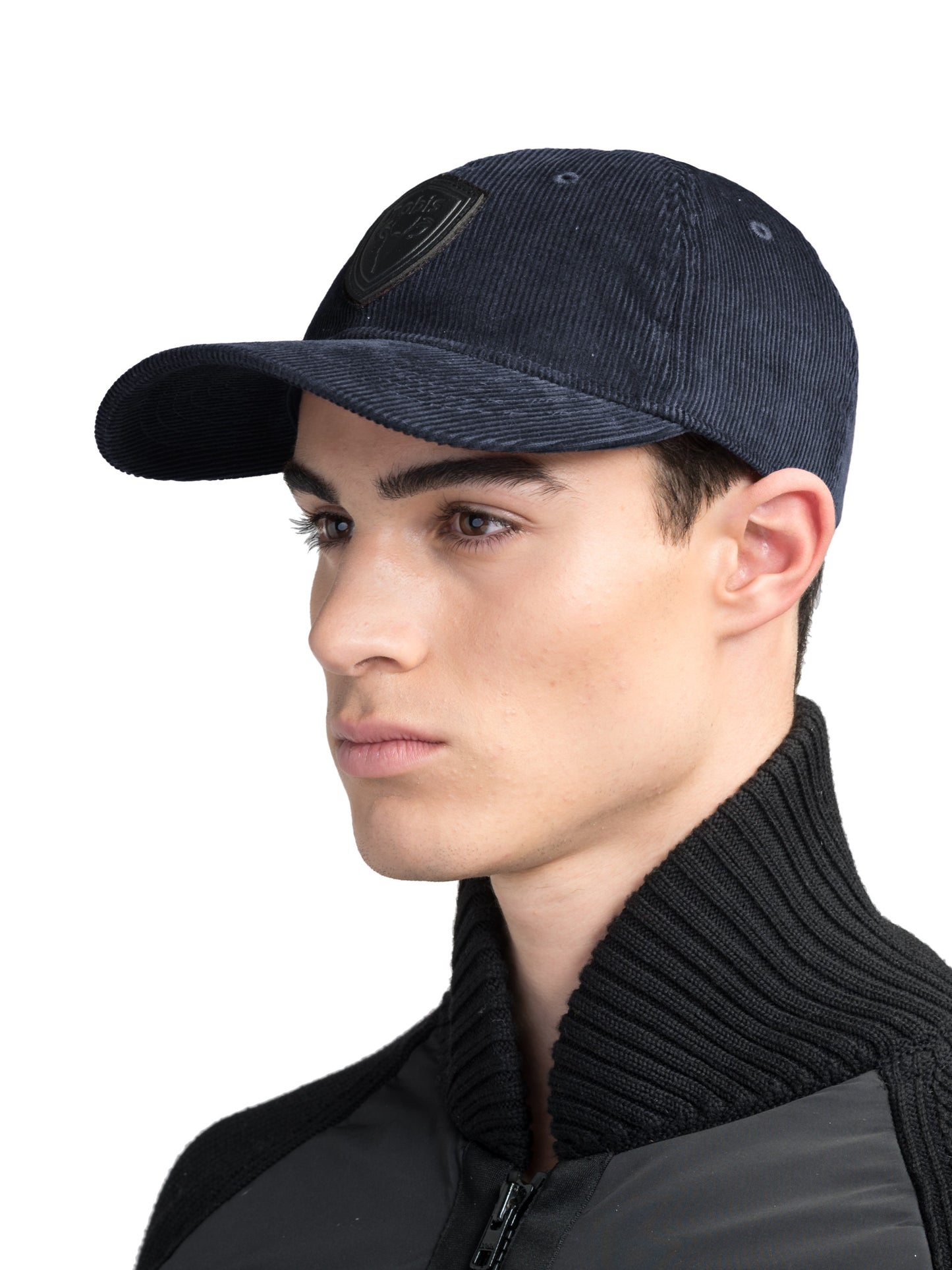 Carter Unisex Tailored Ball Cap in 100% cotton corduroy, unstructured crown, curved brim, and leather strap back with metal buckle closure, in Navy