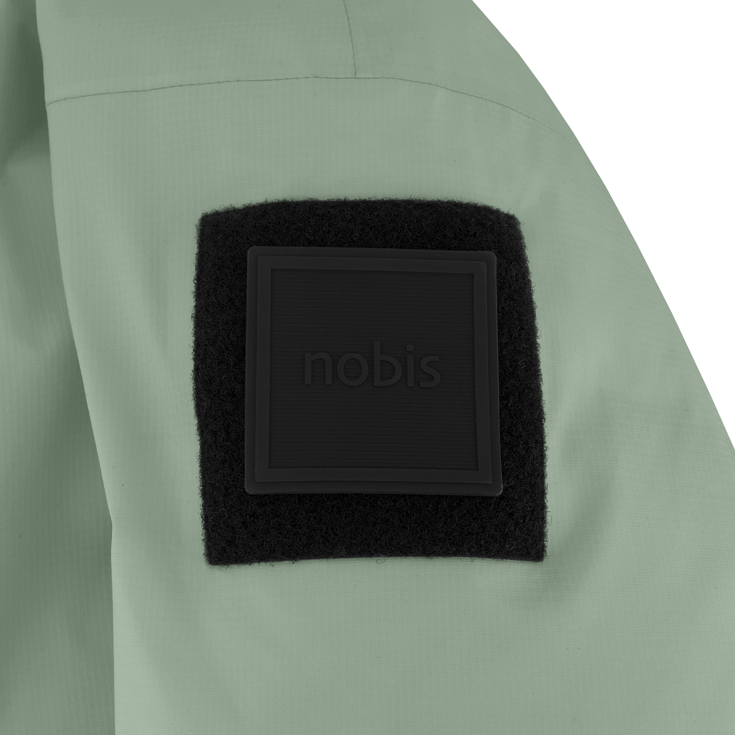 Dixon jacket in Duck Green stretch ripstop fabric with DWR coating, large bellow pockets with magnetic flaps, hidden side-entry zipper pockets, and adjustable cuffs and hem for a tailored fit. Durable, weather-resistant, and versatile.