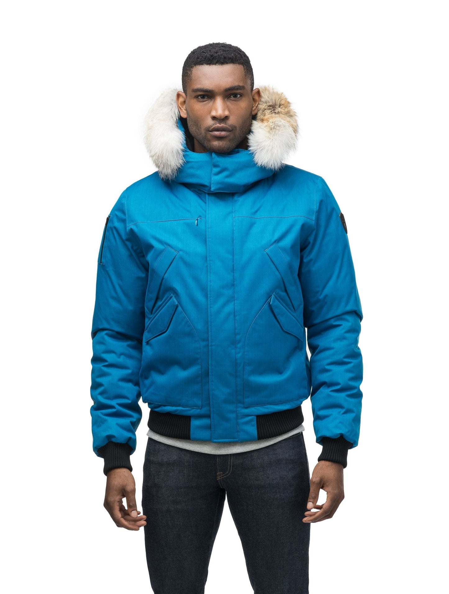 Men's classic down filled bomber jacket with a down filledÃƒÆ’Ã†â€™Ãƒâ€ Ã¢â‚¬â„¢ÃƒÆ’Ã¢â‚¬Â ÃƒÂ¢Ã¢â€šÂ¬Ã¢â€žÂ¢ÃƒÆ’Ã†â€™Ãƒâ€šÃ‚Â¢ÃƒÆ’Ã‚Â¢ÃƒÂ¢Ã¢â€šÂ¬Ã…Â¡Ãƒâ€šÃ‚Â¬ÃƒÆ’Ã¢â‚¬Â¦Ãƒâ€šÃ‚Â¡ÃƒÆ’Ã†â€™Ãƒâ€ Ã¢â‚¬â„¢ÃƒÆ’Ã‚Â¢ÃƒÂ¢Ã¢â‚¬Å¡Ã‚Â¬Ãƒâ€¦Ã‚Â¡ÃƒÆ’Ã†â€™ÃƒÂ¢Ã¢â€šÂ¬Ã…Â¡ÃƒÆ’Ã¢â‚¬Å¡Ãƒâ€šÃ‚Â hood that features a removable coyote fur trim and concealed moldable framing wire in Sea Blue
