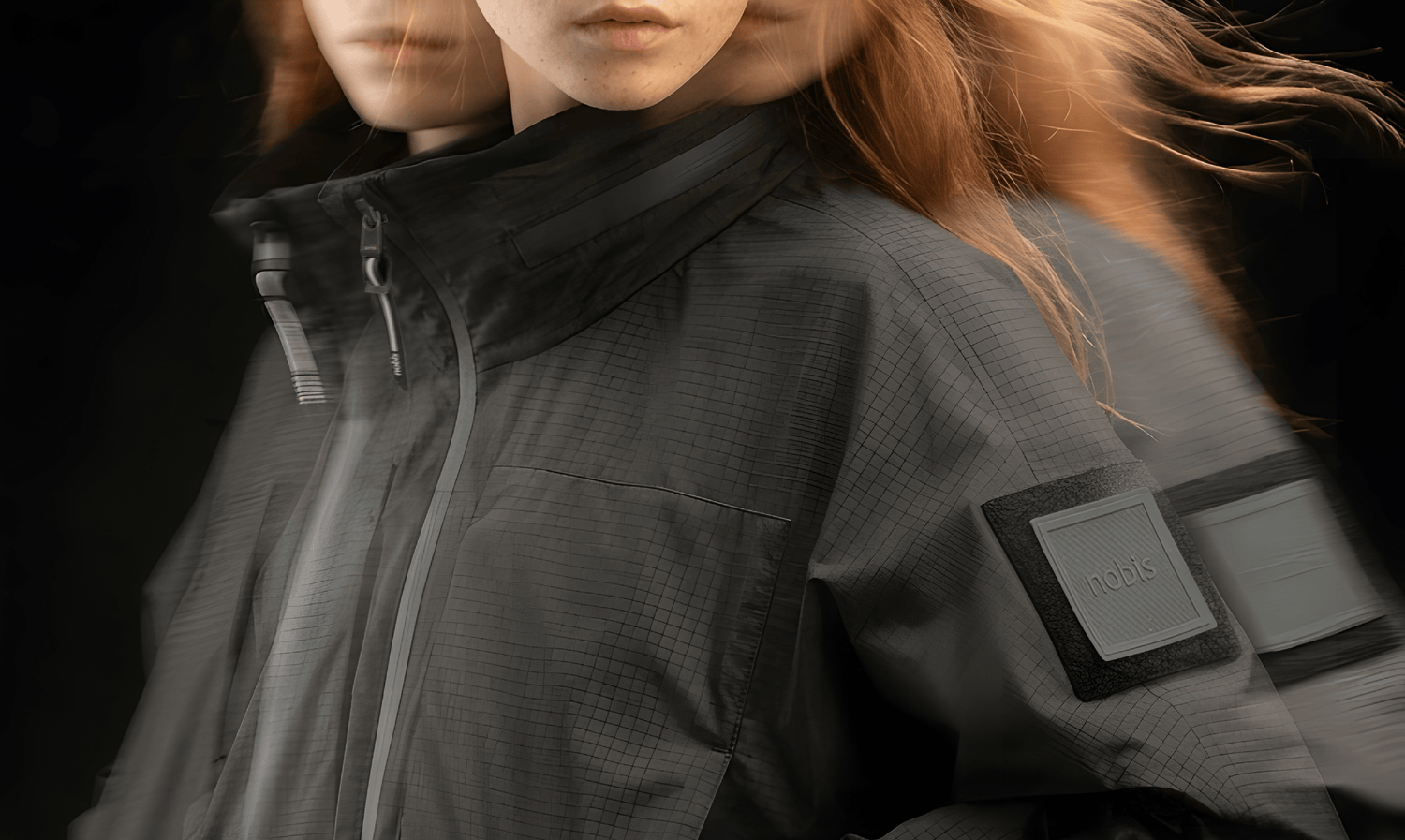 Image of a female model posing with a motion blur effect and wears the Nobis Epsie in Black on a black background.