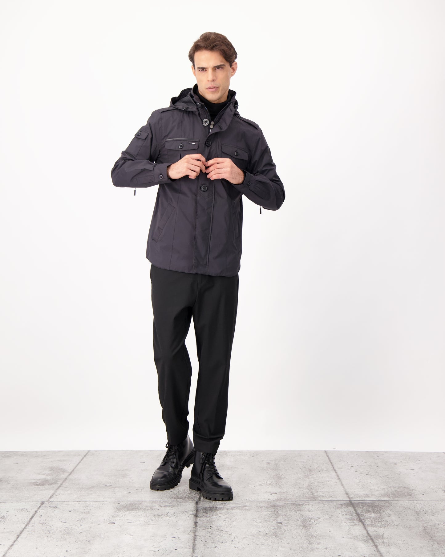 Fisherman is a men’s lightweight waterproof jacket offering exceptional durability, crafted from matte technical taffeta with a breathable, seam-sealed construction for dependable weather protection in Black