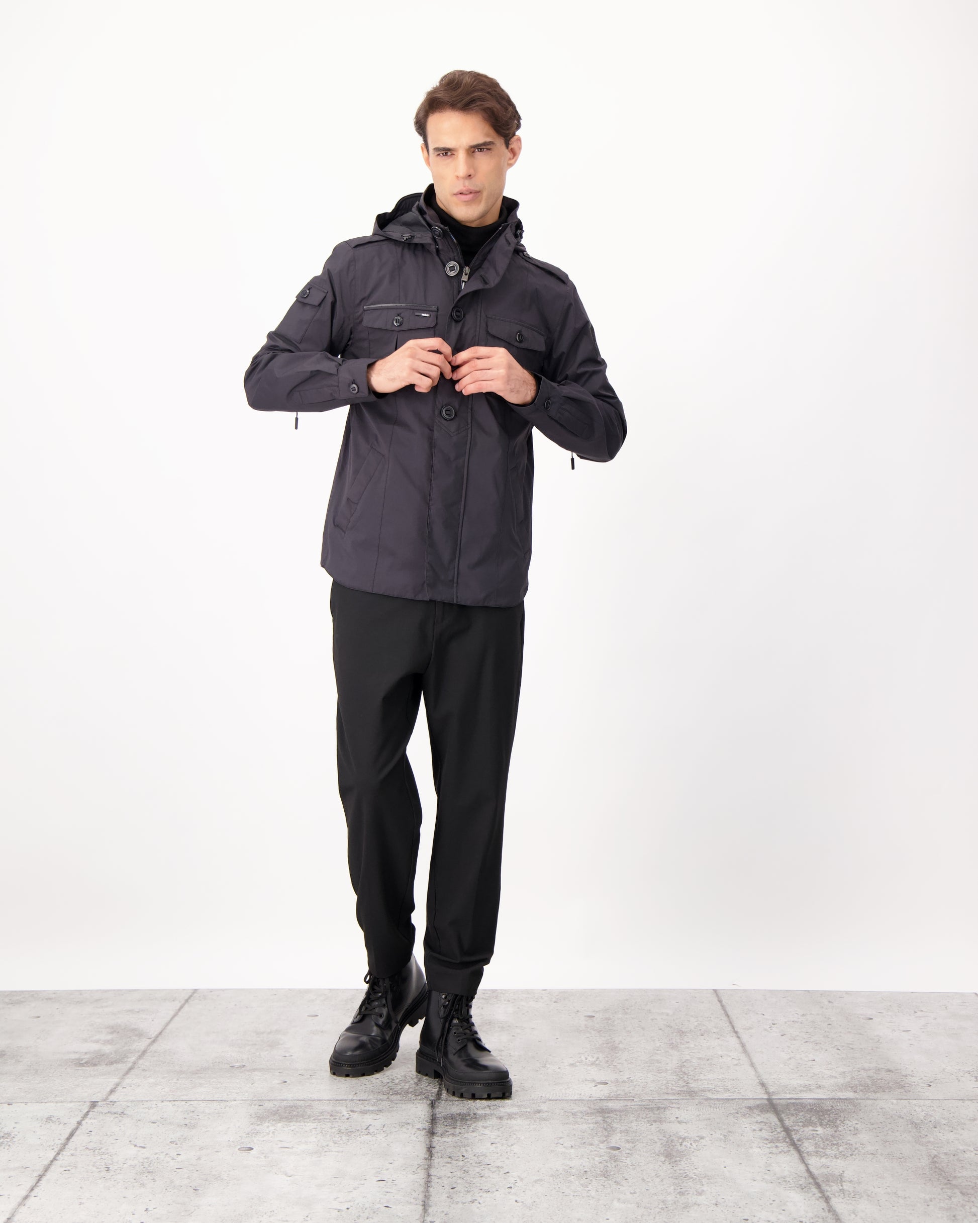 Fisherman is a men’s lightweight waterproof jacket offering exceptional durability, crafted from matte technical taffeta with a breathable, seam-sealed construction for dependable weather protection in Black