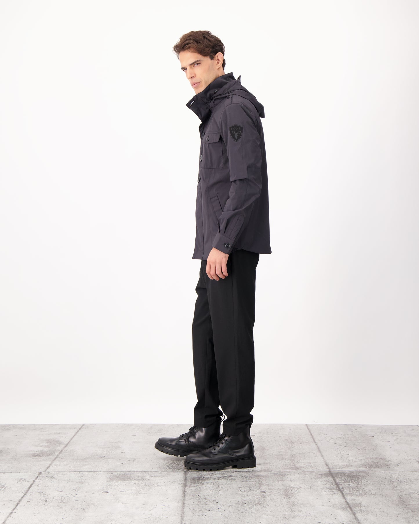 Fisherman is a men’s lightweight waterproof jacket offering exceptional durability, crafted from matte technical taffeta with a breathable, seam-sealed construction for dependable weather protection in Black