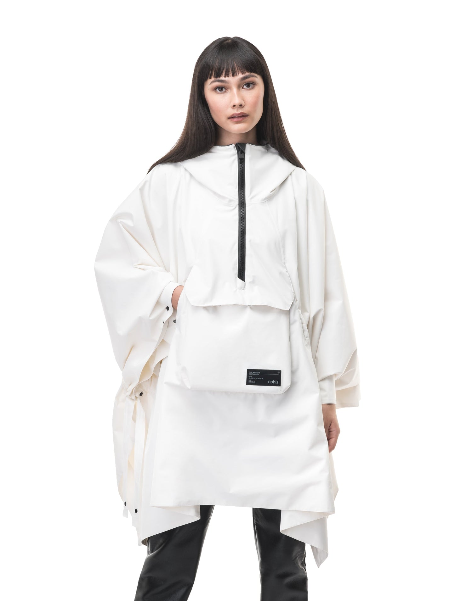 Hydra Unisex Performance Poncho in thigh length, non-removable hood, vertical half-zipper along centre front collar, hidden side-entry waist zipper pockets, adjustable webbing straps and snap closure cuffs, and packable to front kangaroo pocket with flap opening, in Chalk