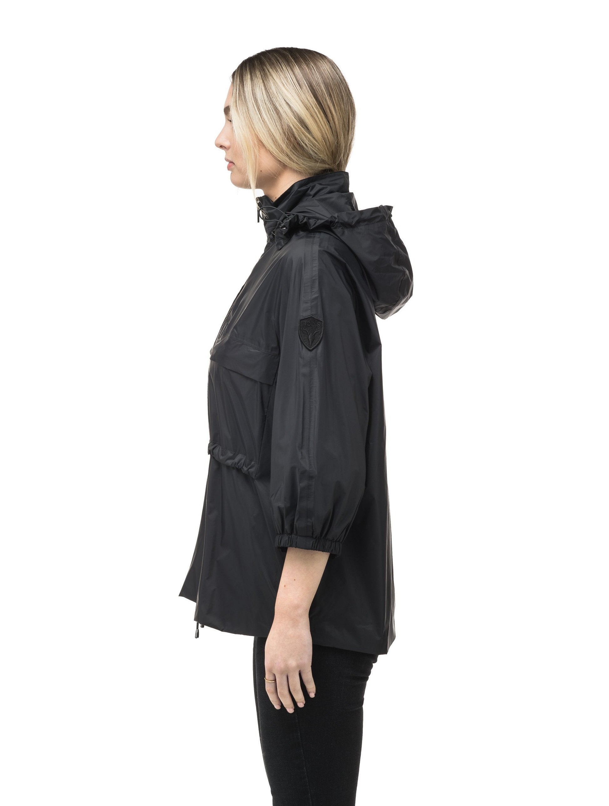 Women's waist length windbreaker with two chest pockets in Black