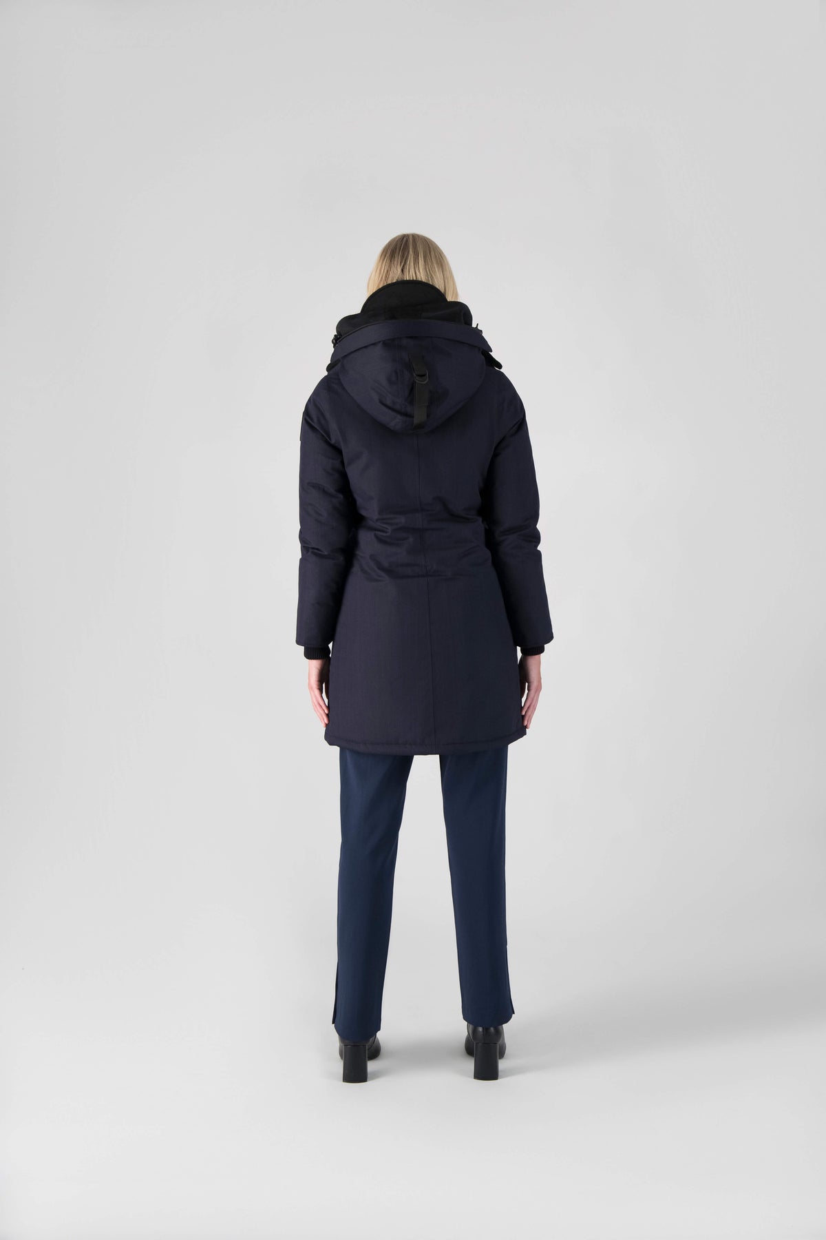 Best selling women's down filled knee length parka with removable down filled hood in Navy