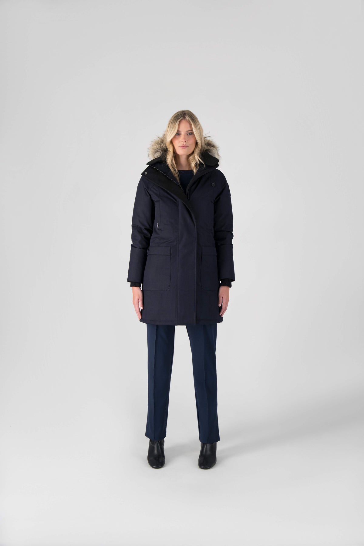 Best selling women's down filled knee length parka with removable down filled hood in Navy