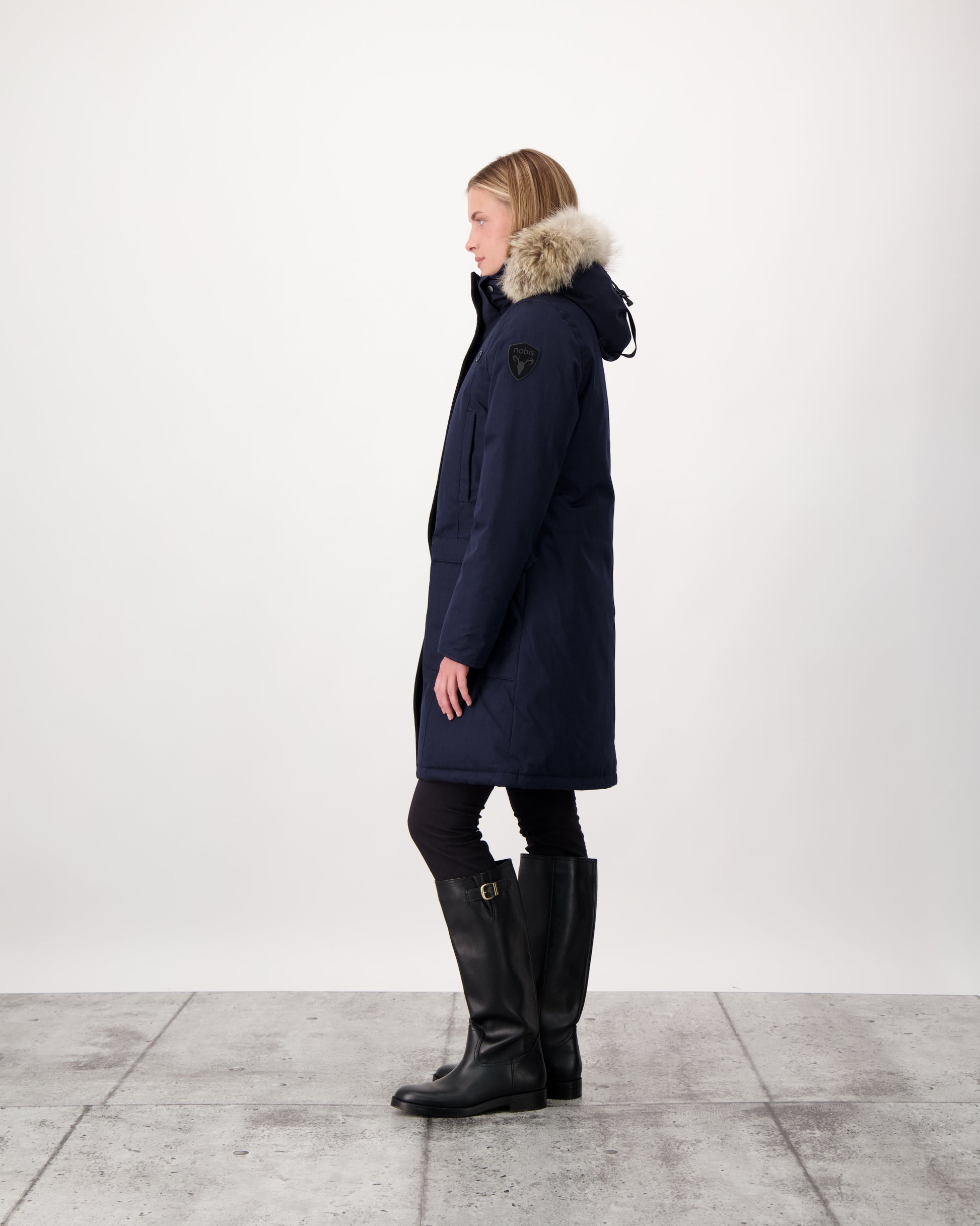 Best selling women's down filled knee length parka with removable down filled hood in CH Navy