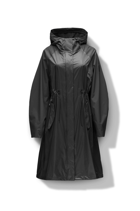 Reyna Women's Tailored Packable Long Shell Jacket in knee length, premium strech ripstop and contrast cire technical nylon taffeta fabrication, non-removable hood with adjustable draw cord, waist flap pockets with magnetic closures, adjustable draw cords at waist and bottom hem, adjustable snap cuffs, mesh back ventilation, hidden packable pocket, snap button wind flap, two-way branded zipper at centre front, adjustable snap button fishtail yoke at back, and large interior zipper pocket, in Black + Black