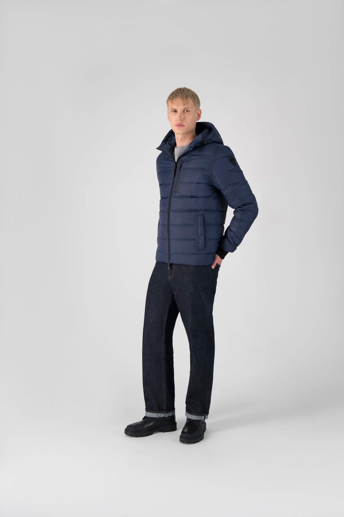Hip length, reversible men's down filled jacket with removable hood in Marine