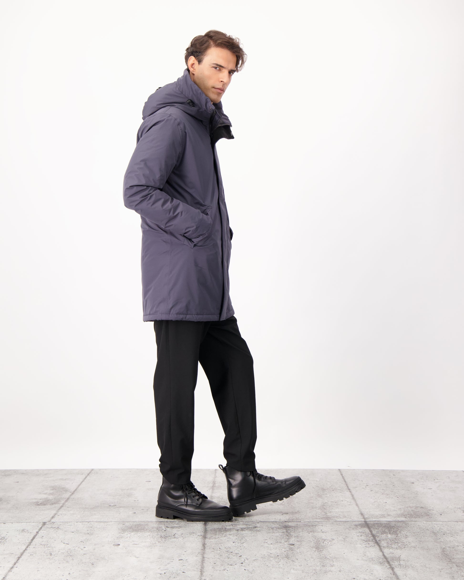 Pierre Men's Jacket in thigh length, Canadian white duck down insulation, non-removable down-filled hood, angled waist pockets, centre-front zipper with wind flap, and elastic ribbed cuffs, in 3L Navy