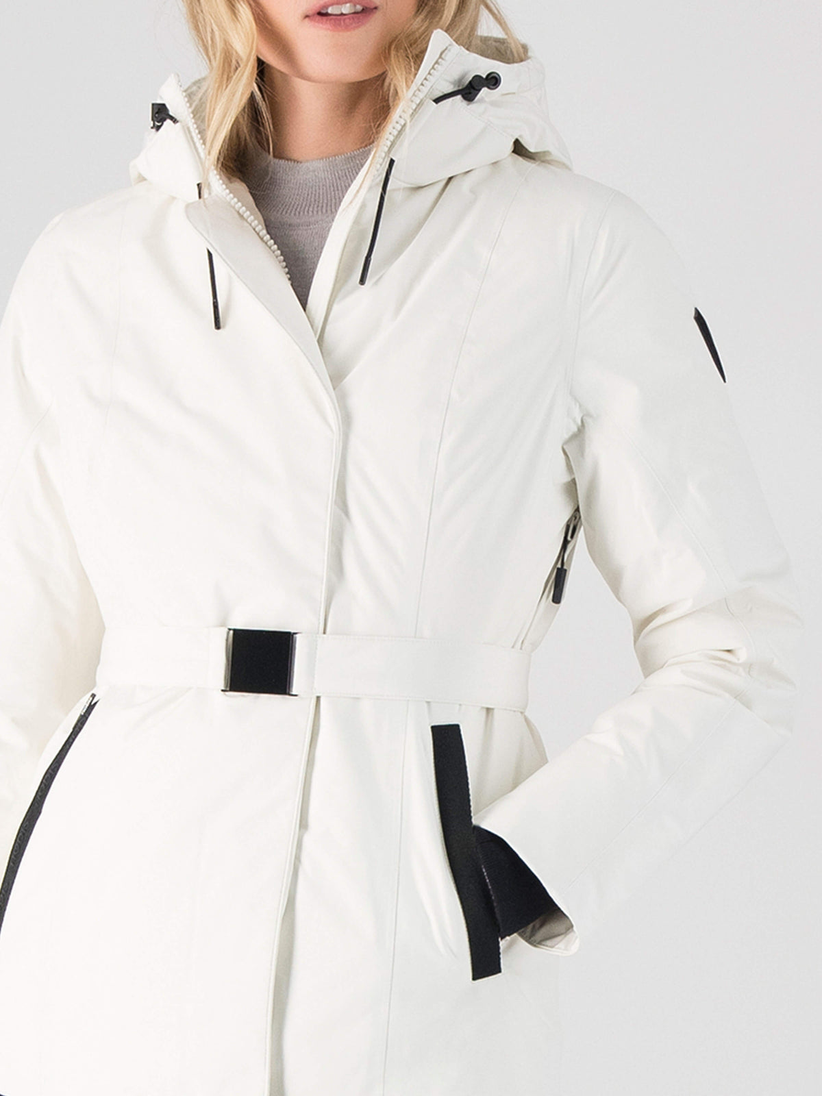 Ladies hip length down-filled parka with non-removable hood and adjustable belt in Chalk