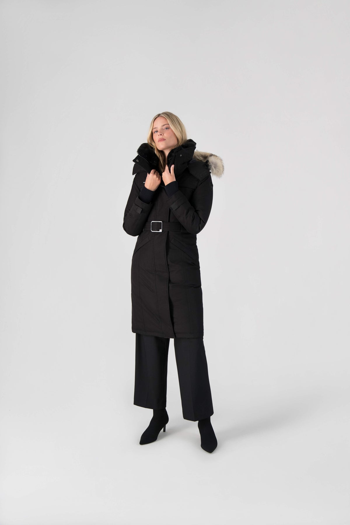 She-Ra women's parka featuring a seam-sealed, waterproof, breathable shell, removable fur trim, magnetic closures, and an adjustable belted waist in Black