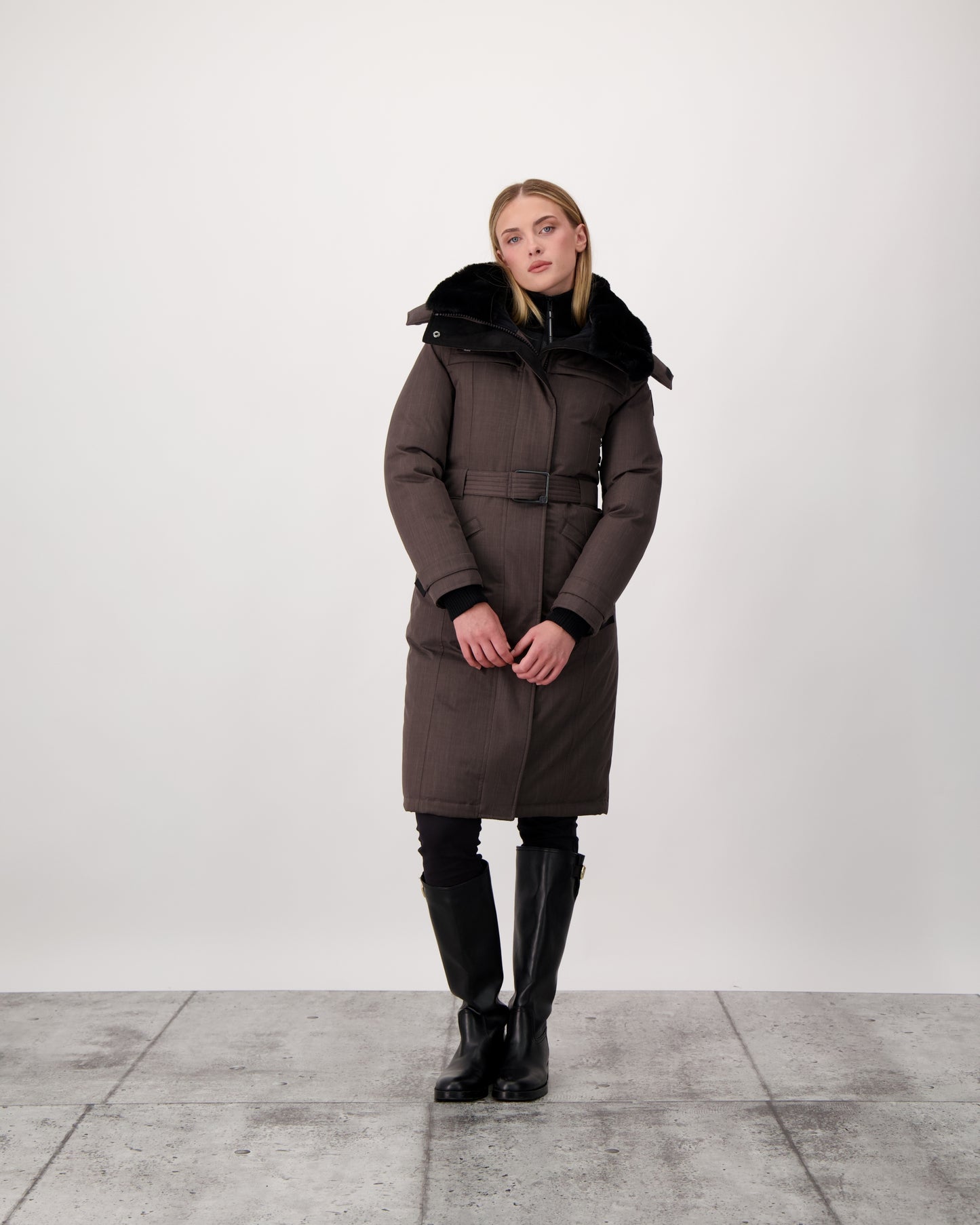 She-Ra women's parka featuring a seam-sealed, waterproof, breathable shell, removable fur trim, magnetic closures, and an adjustable belted waist in Steel Grey