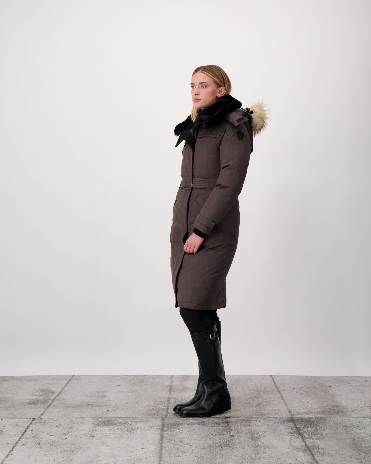 She-Ra women's parka featuring a seam-sealed, waterproof, breathable shell, removable fur trim, magnetic closures, and an adjustable belted waist in Steel Grey