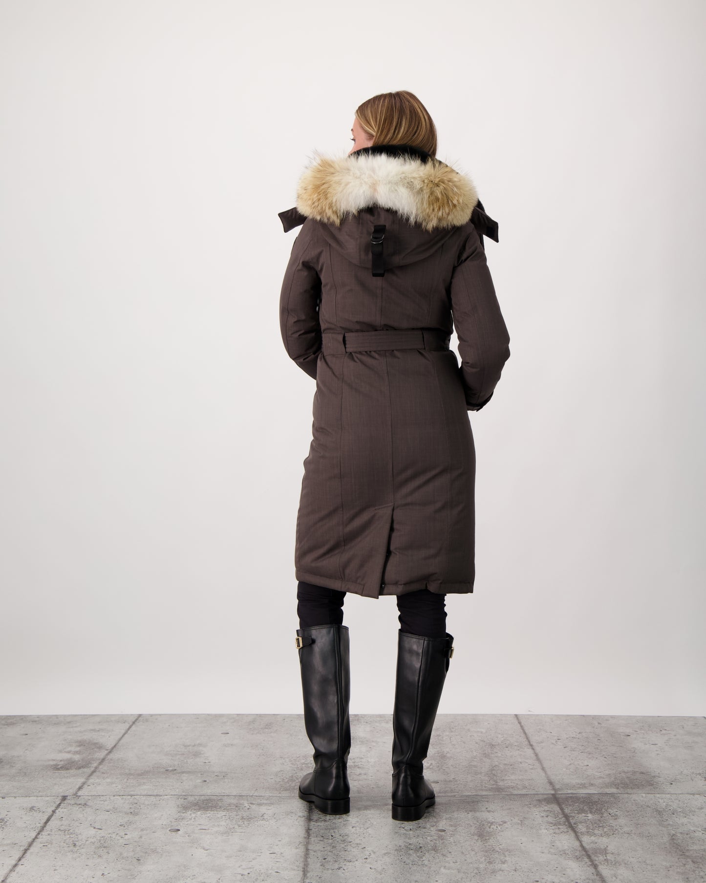 She-Ra women's parka featuring a seam-sealed, waterproof, breathable shell, removable fur trim, magnetic closures, and an adjustable belted waist in Steel Grey