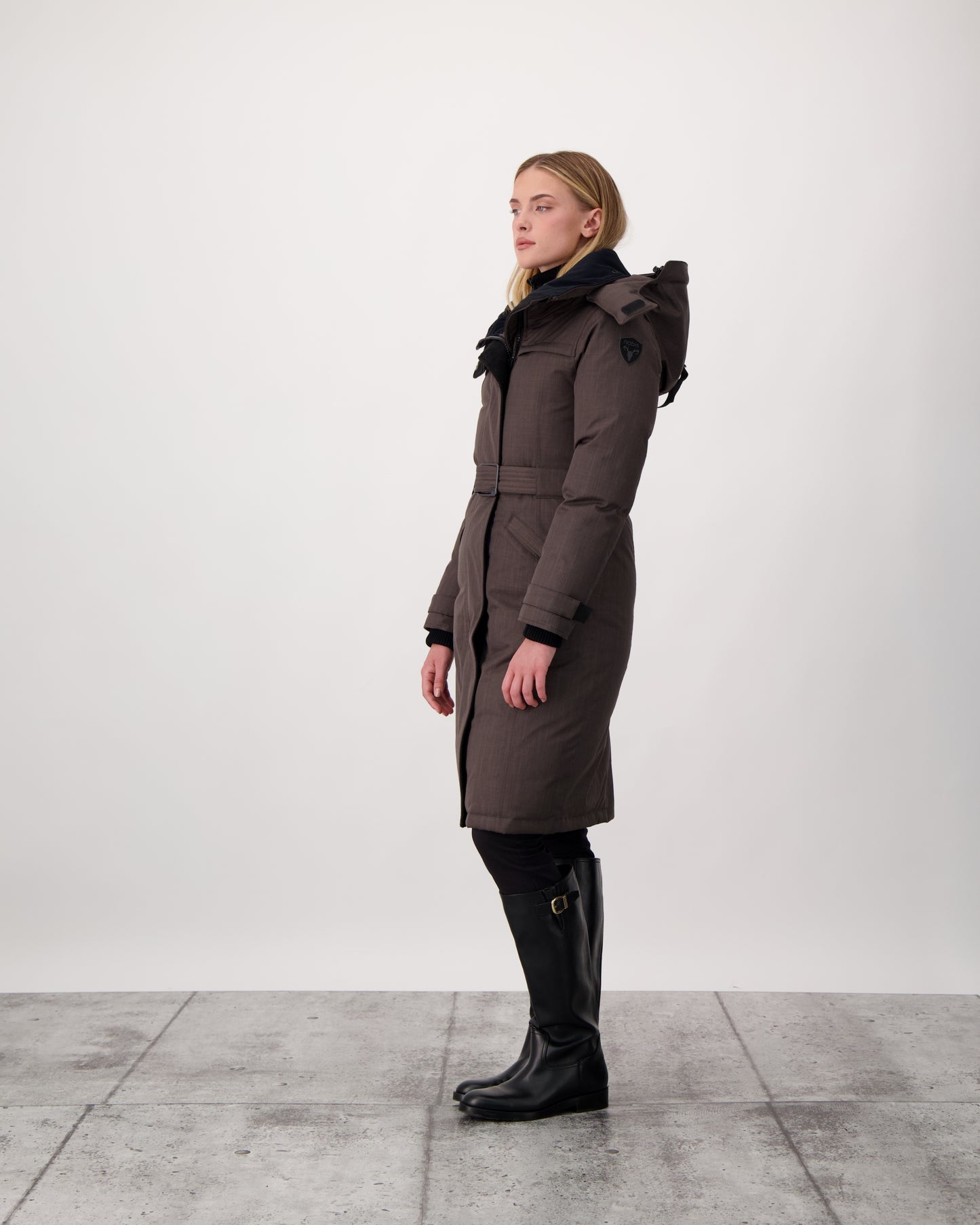 She-Ra women's parka featuring a seam-sealed, waterproof, breathable shell, removable fur trim, magnetic closures, and an adjustable belted waist in Steel Grey