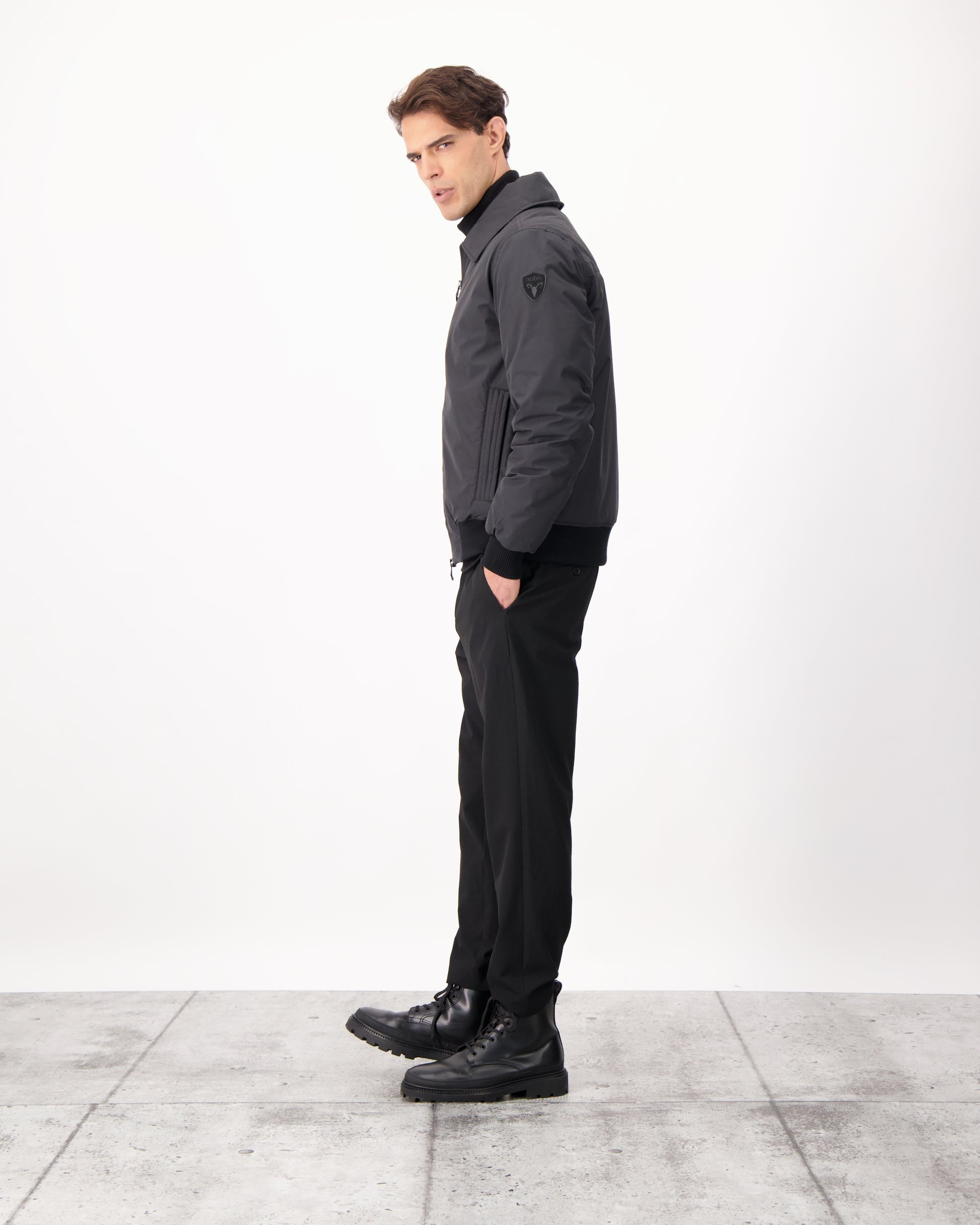 Sonar Men's Aviator Jacket in hip length, Canadian duck down insulation, removable shearling collar with hidden tuckable hood, and two-way front zipper, in Black