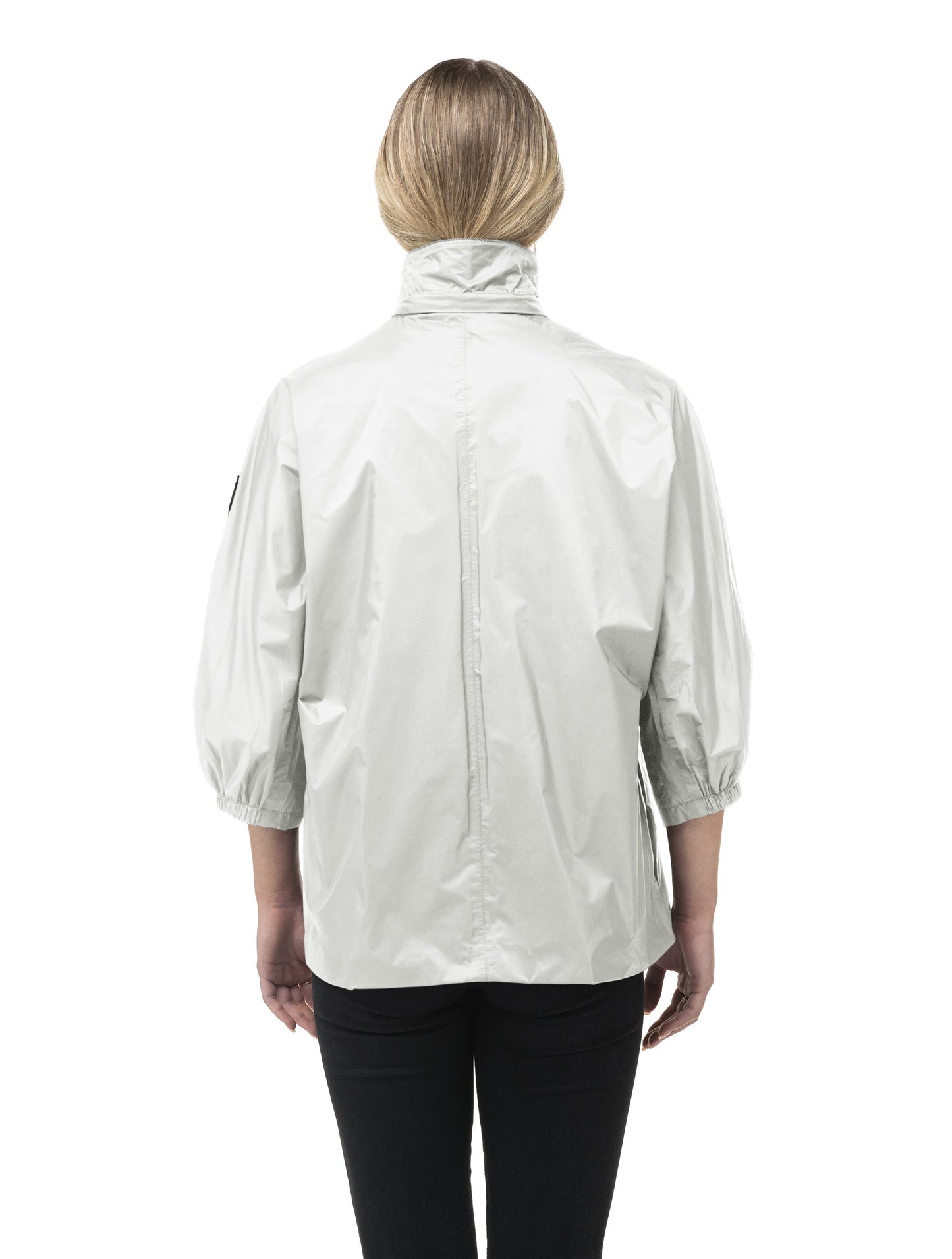 Women's waist length windbreaker with two chest pockets in Light Grey