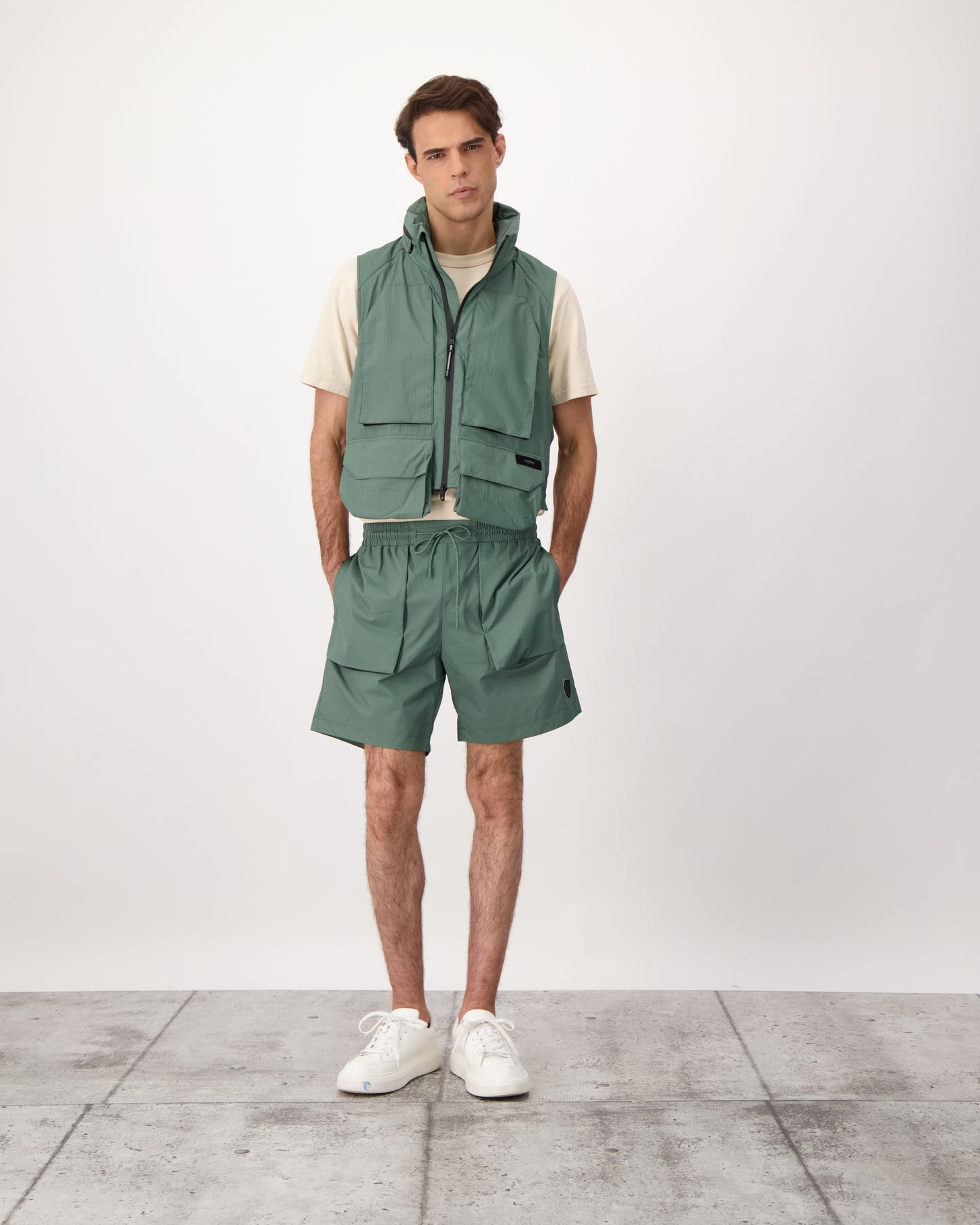 Tiber is a men’s lightweight waterproof short in Duck Green