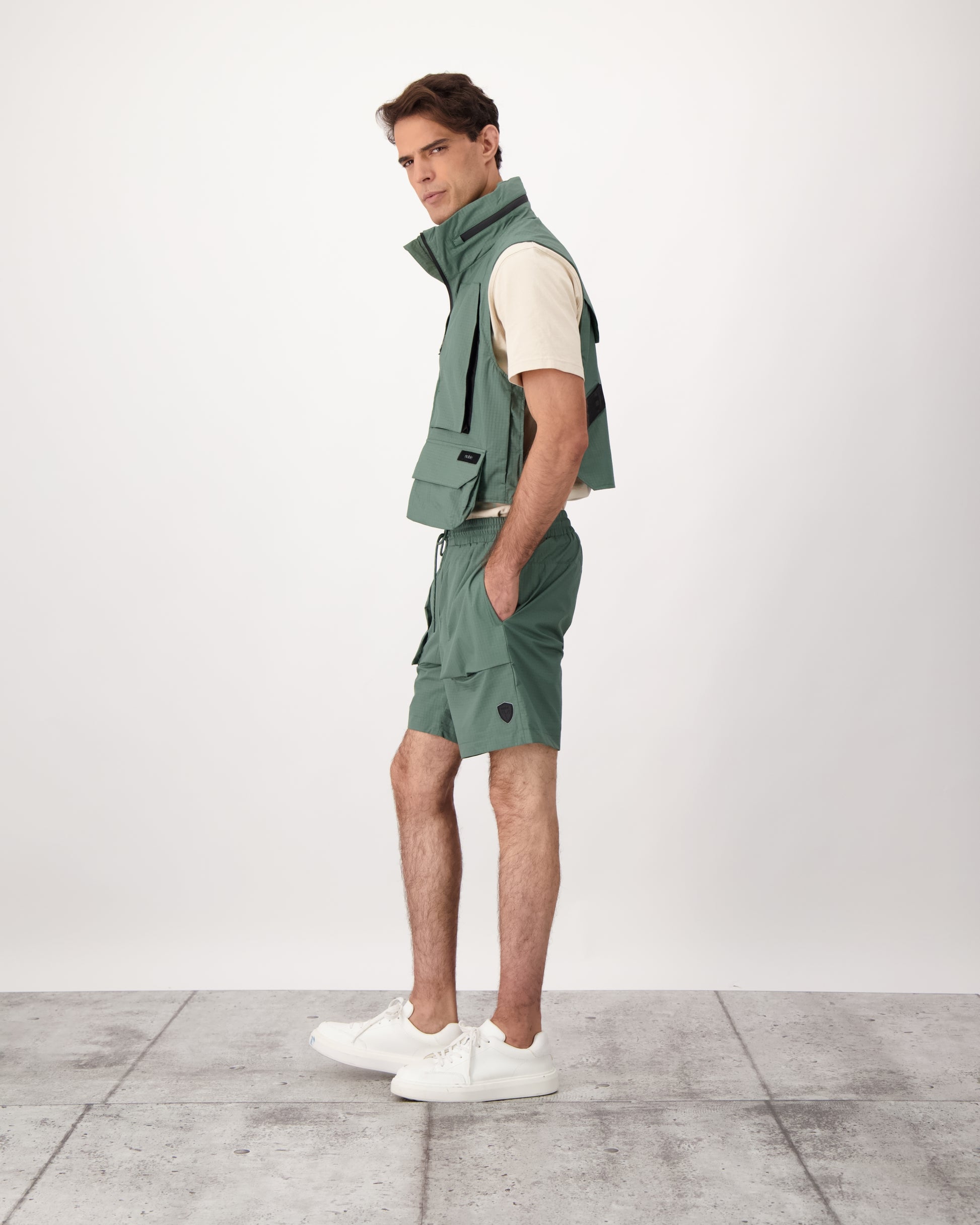 Tiber is a men’s lightweight waterproof short in Duck Green